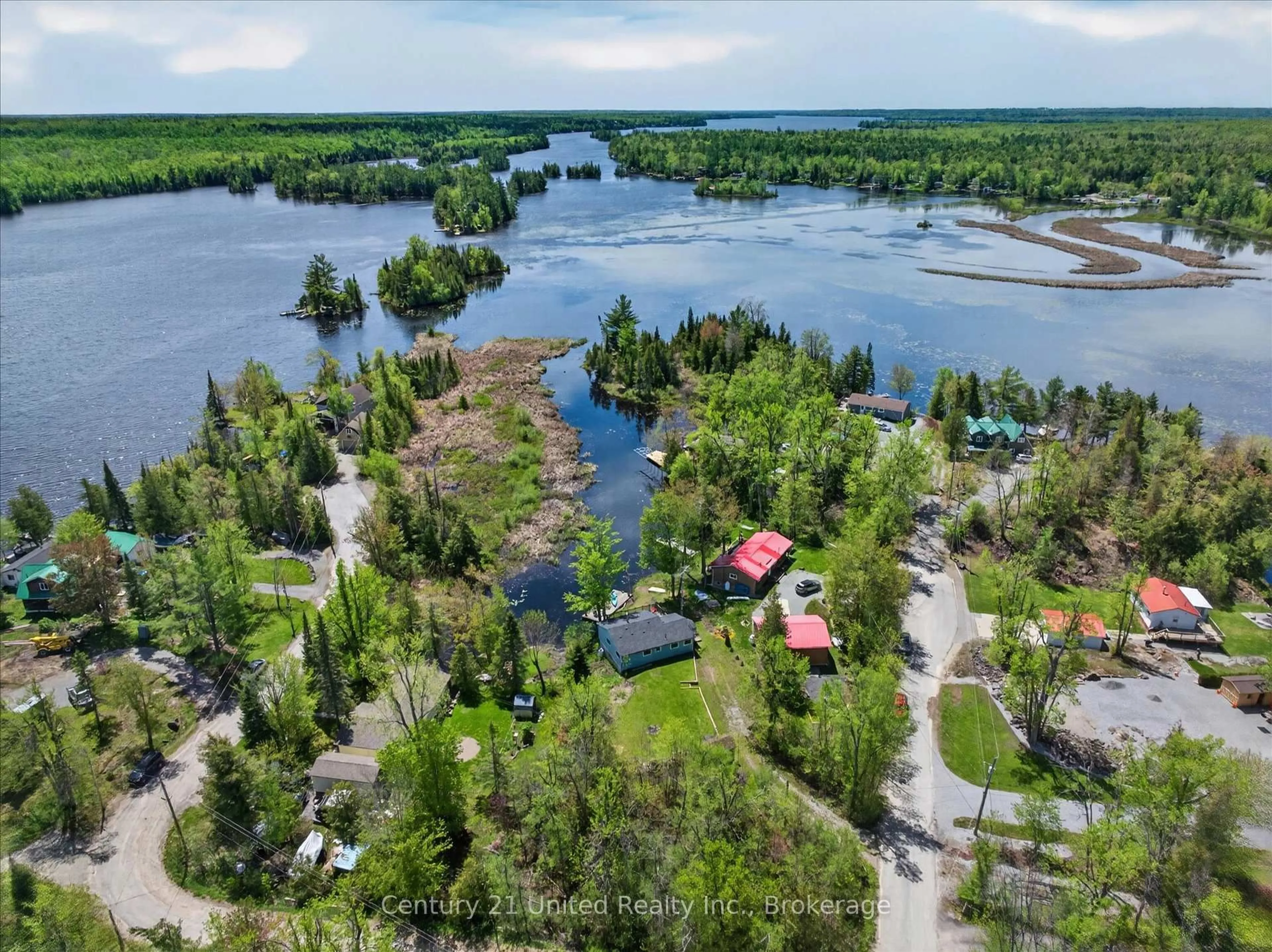 A pic from outside/outdoor area/front of a property/back of a property/a pic from drone, water/lake/river/ocean view for 113 Peninsula Dr, Trent Lakes Ontario K0M 1A0