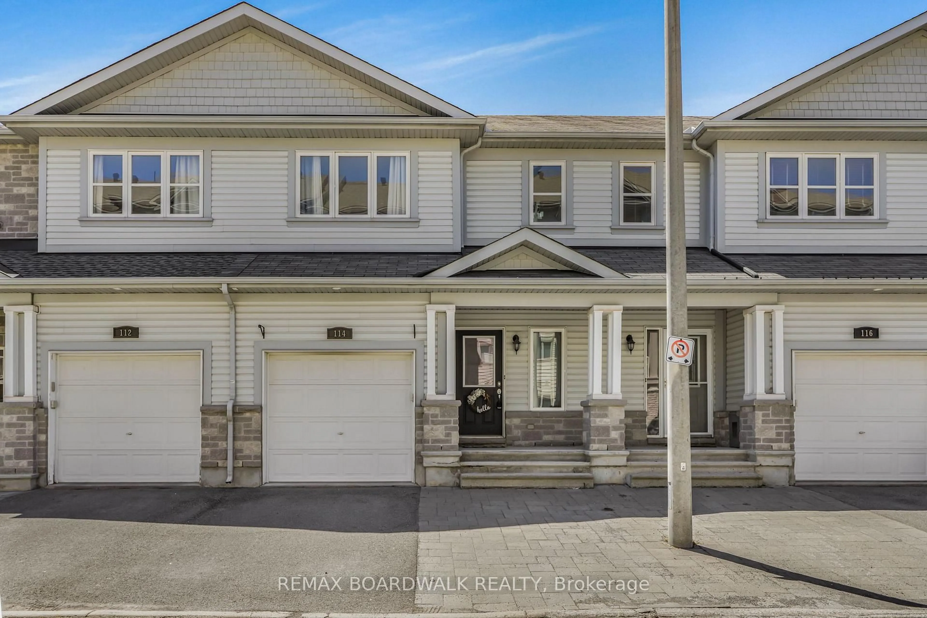 Home with vinyl exterior material, street for 114 Potts Private, Ottawa Ontario K4A 0N7