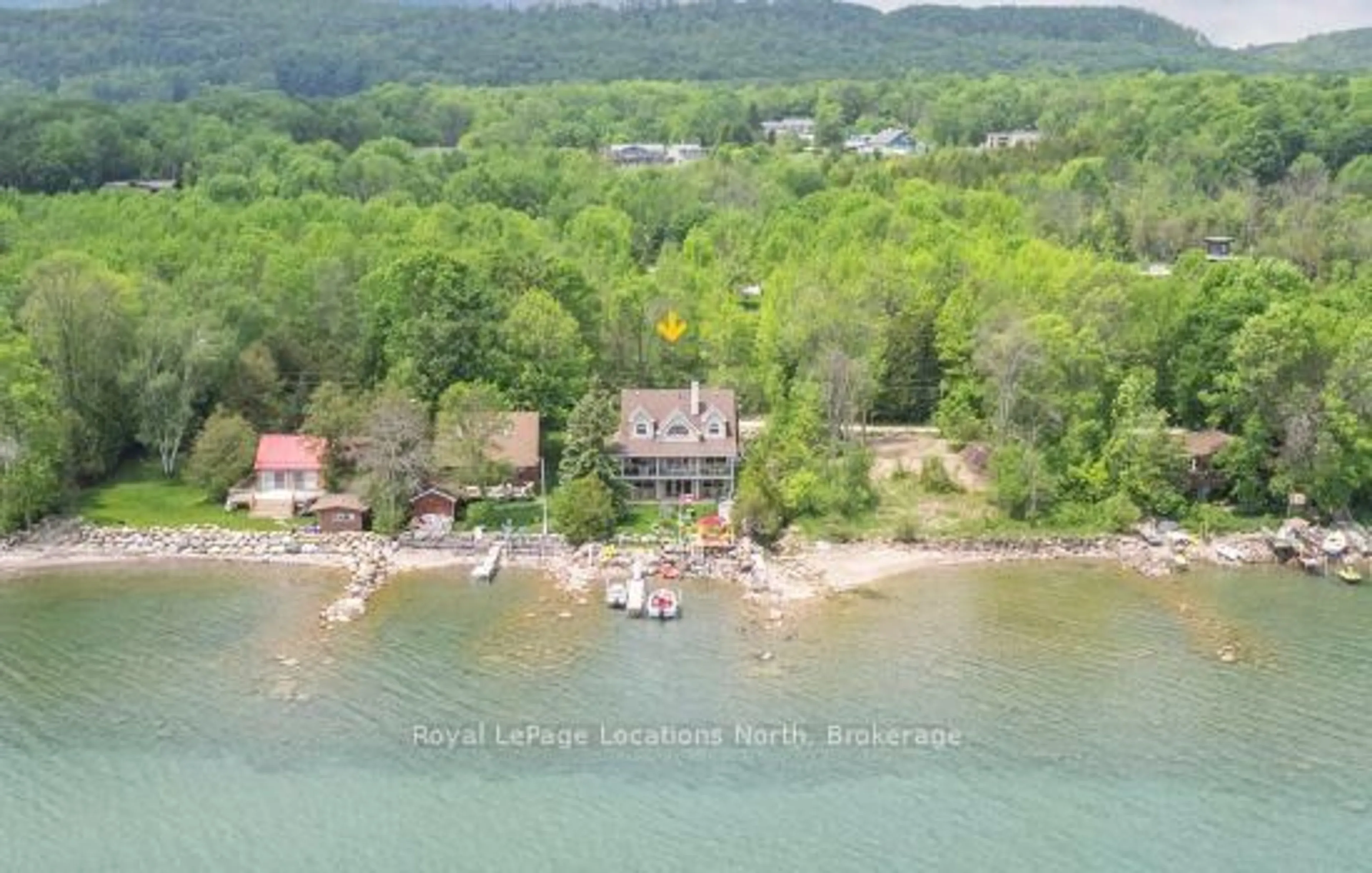 A pic from outside/outdoor area/front of a property/back of a property/a pic from drone, water/lake/river/ocean view for 261 Cedar Ave, Meaford Ontario N4L 1W5