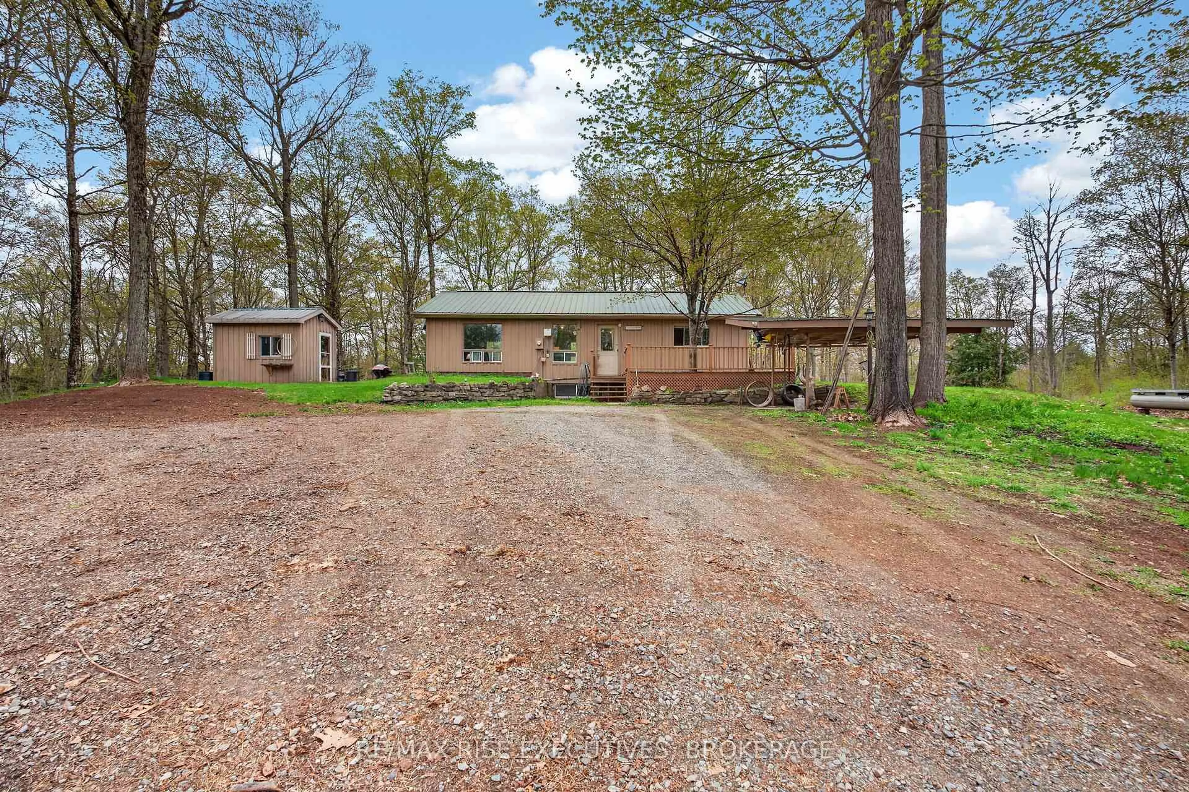 A pic from outside/outdoor area/front of a property/back of a property/a pic from drone, street for 750 Christie Lake North Shore Rd, Perth Ontario K7H 3C6