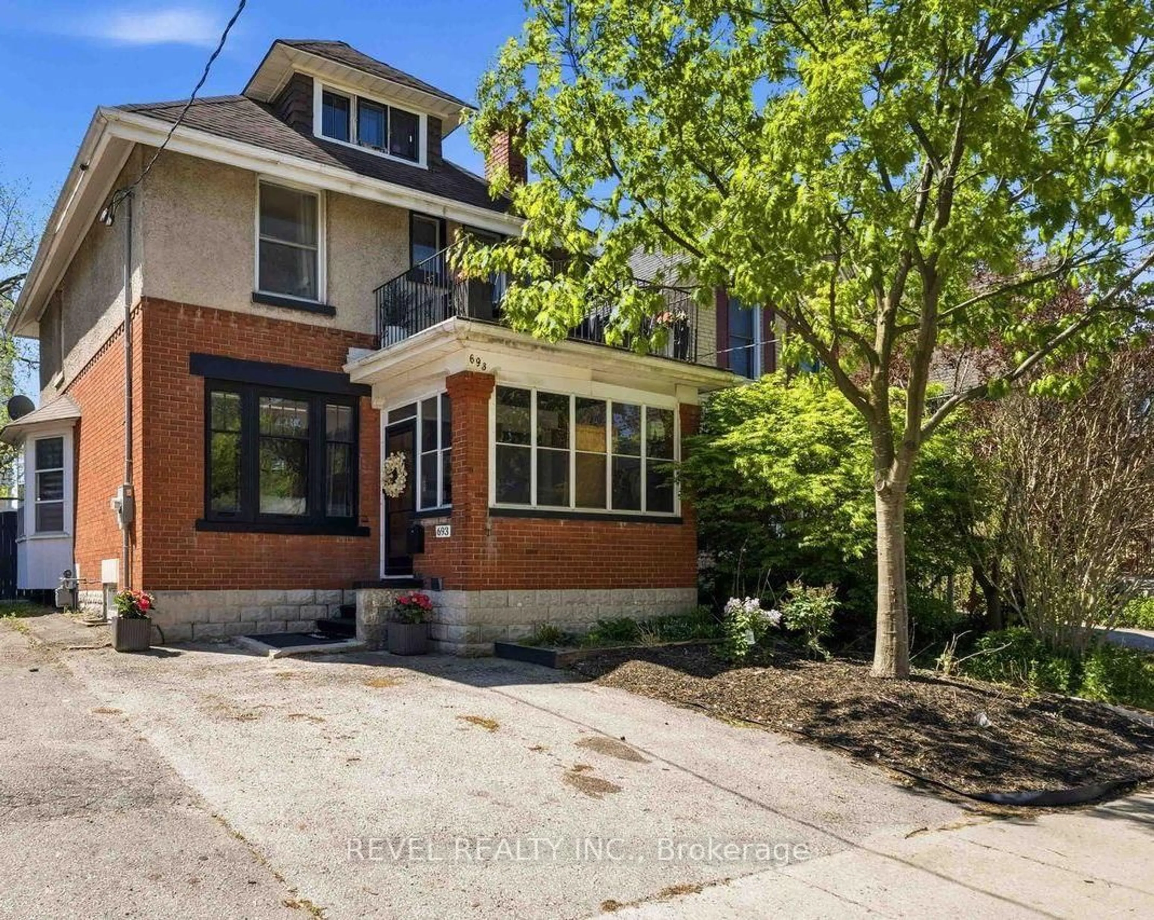 Home with brick exterior material, street for 693 Queens Ave, London East Ontario N5W 3H4