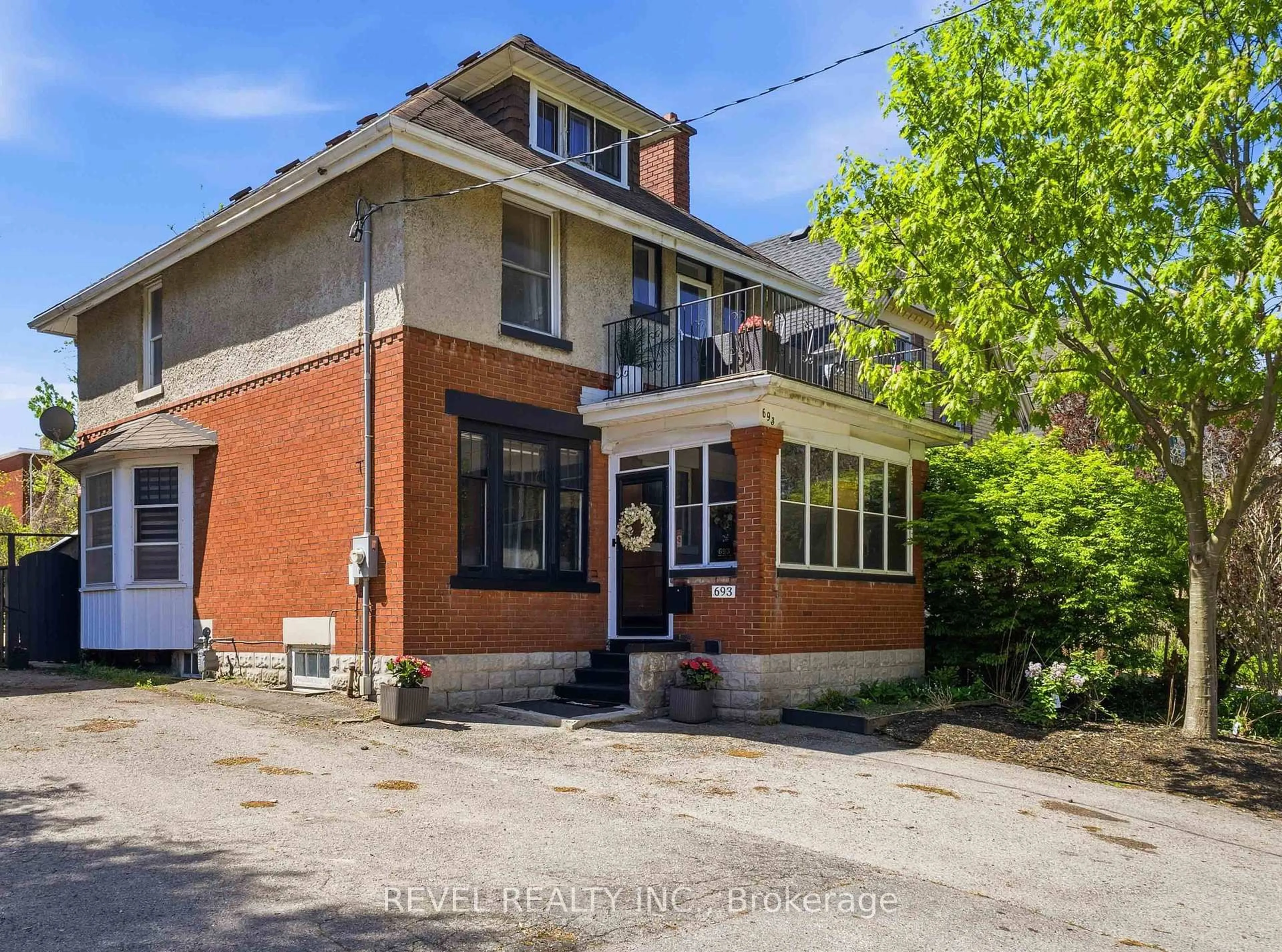 Home with brick exterior material, street for 693 Queens Ave, London East Ontario N5W 3H4