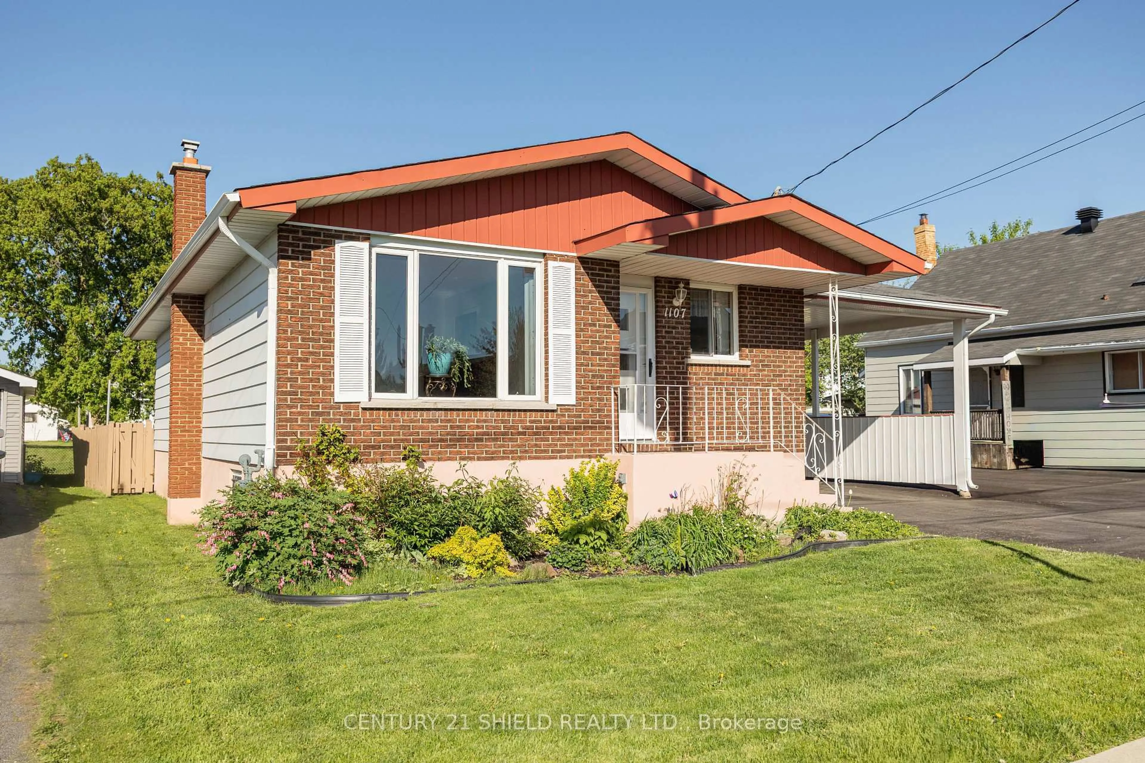 Home with brick exterior material, street for 1107 Grand Ave, Cornwall Ontario K6H 4T6