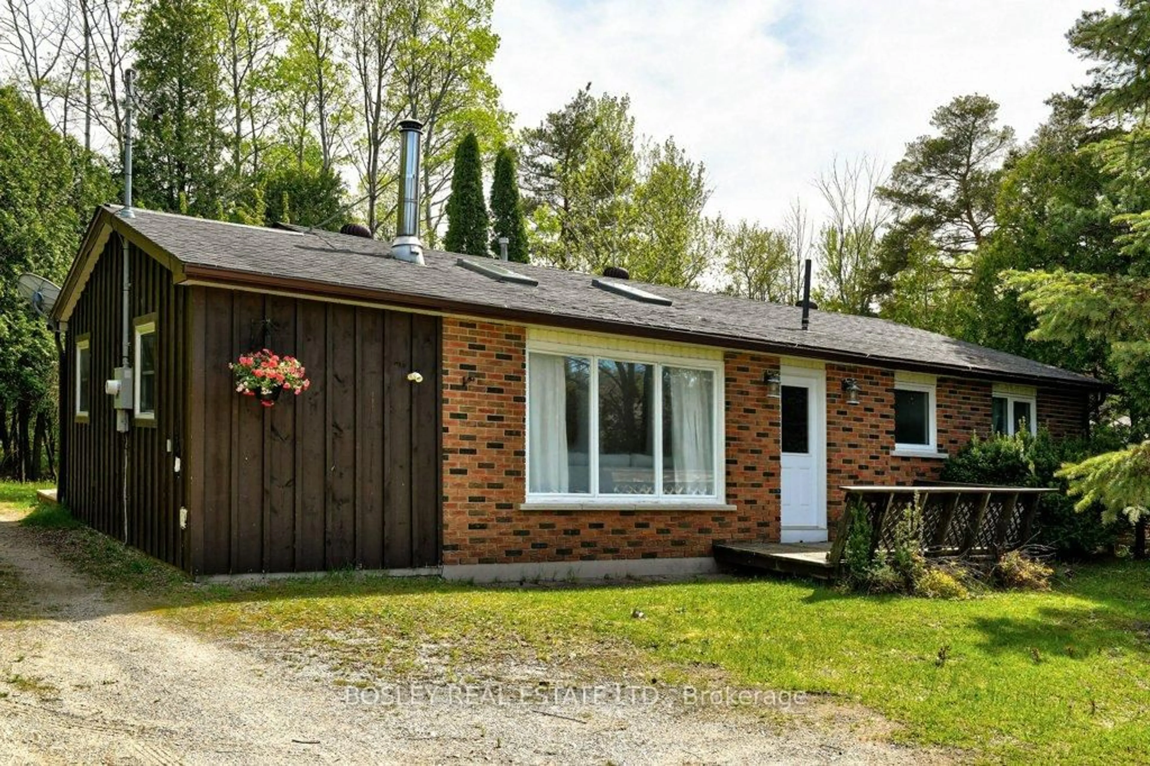 Home with brick exterior material, street for 209794 Highway 26, Blue Mountains Ontario L9Y 0L8