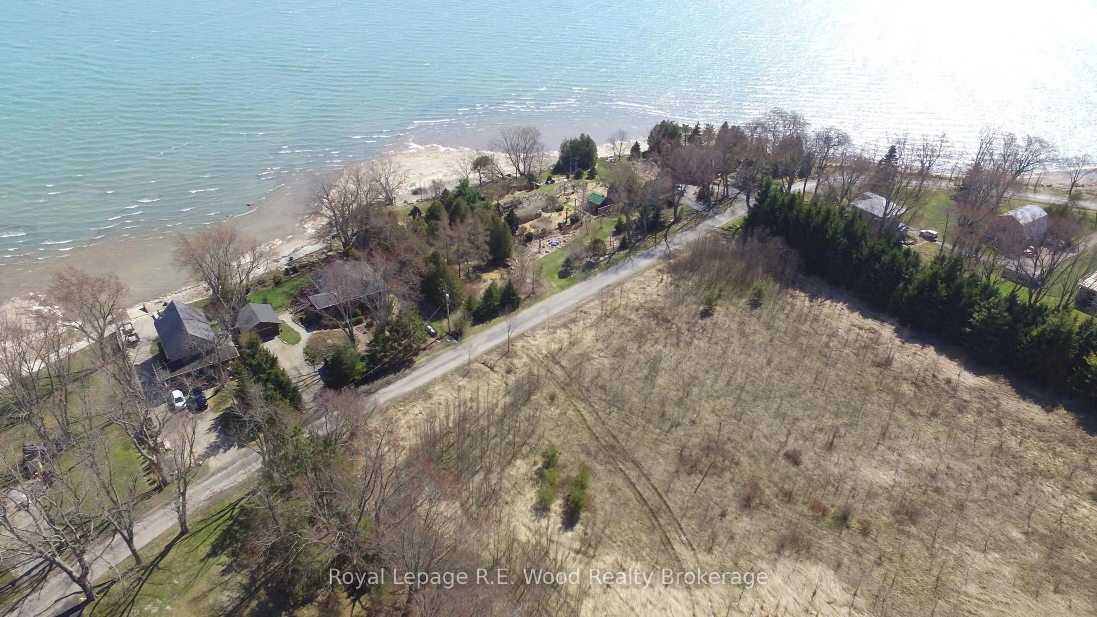 A pic from outside/outdoor area/front of a property/back of a property/a pic from drone, water/lake/river/ocean view for 1806 Lakeshore Rd, Haldimand Ontario N0A 1P0