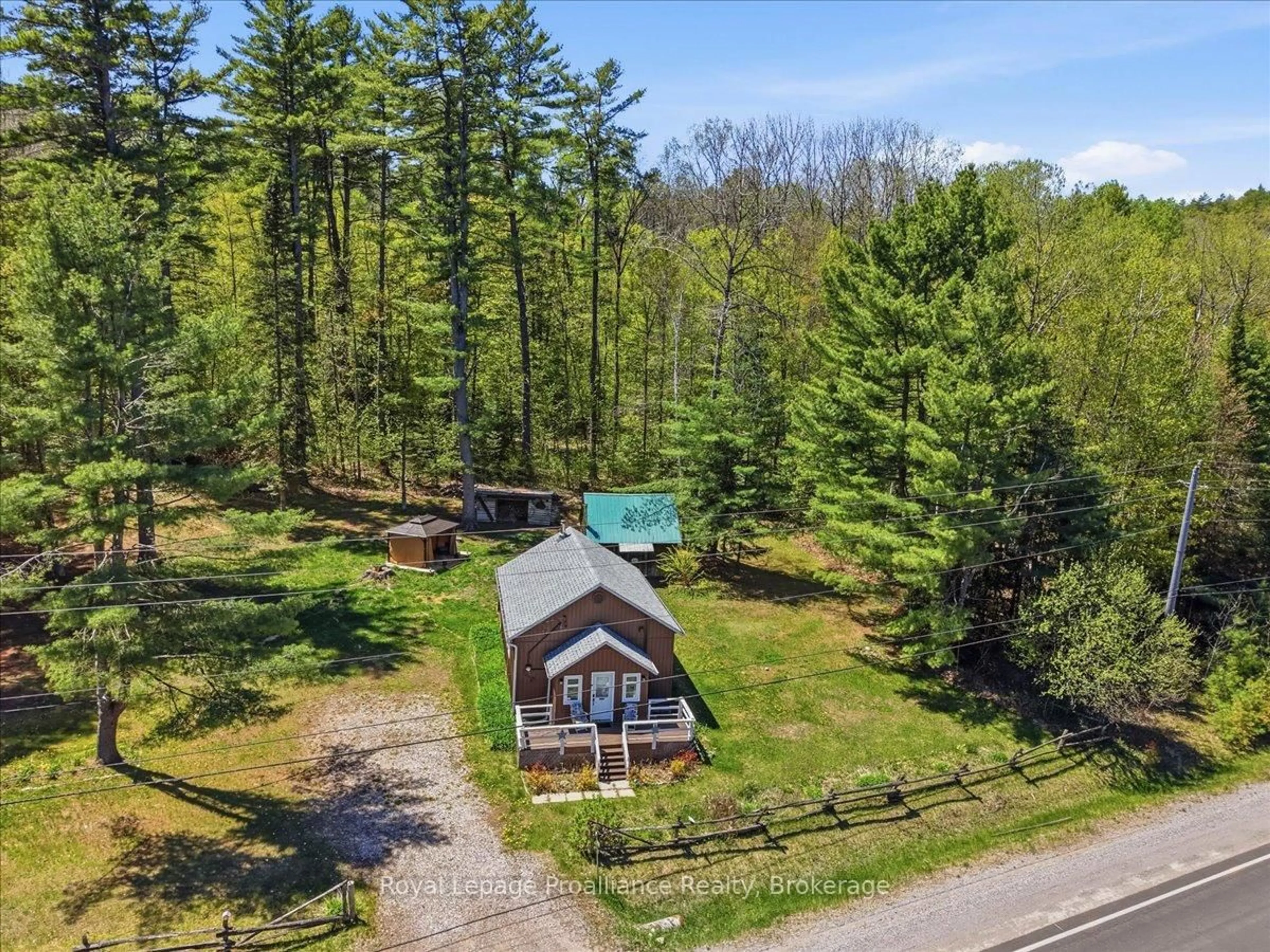 A pic from outside/outdoor area/front of a property/back of a property/a pic from drone, forest/trees view for 18128 Highway 41, Plevna Ontario K0H 2M0