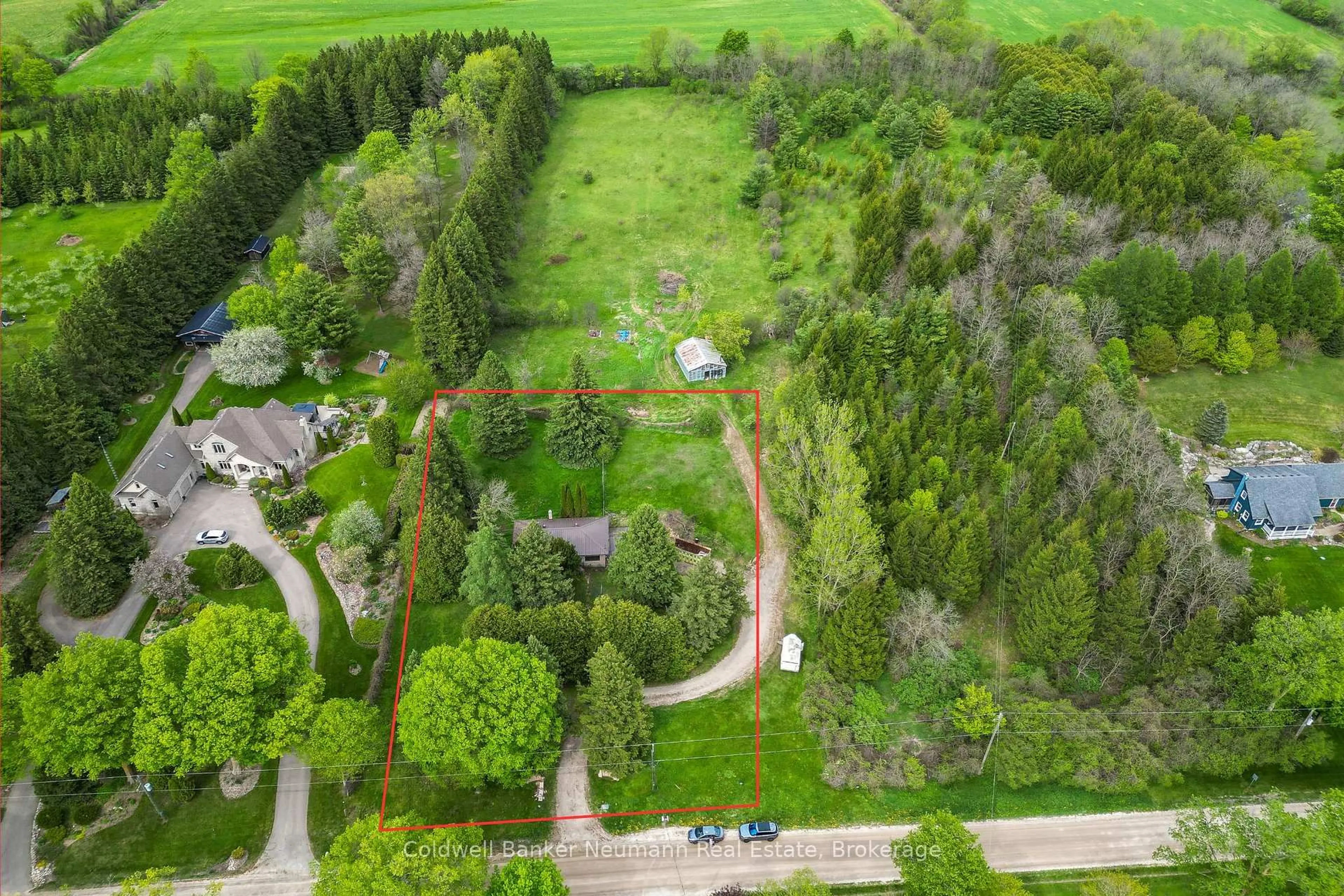 A pic from outside/outdoor area/front of a property/back of a property/a pic from drone, forest/trees view for 111 Carter Rd, Puslinch Ontario N1H 6H8