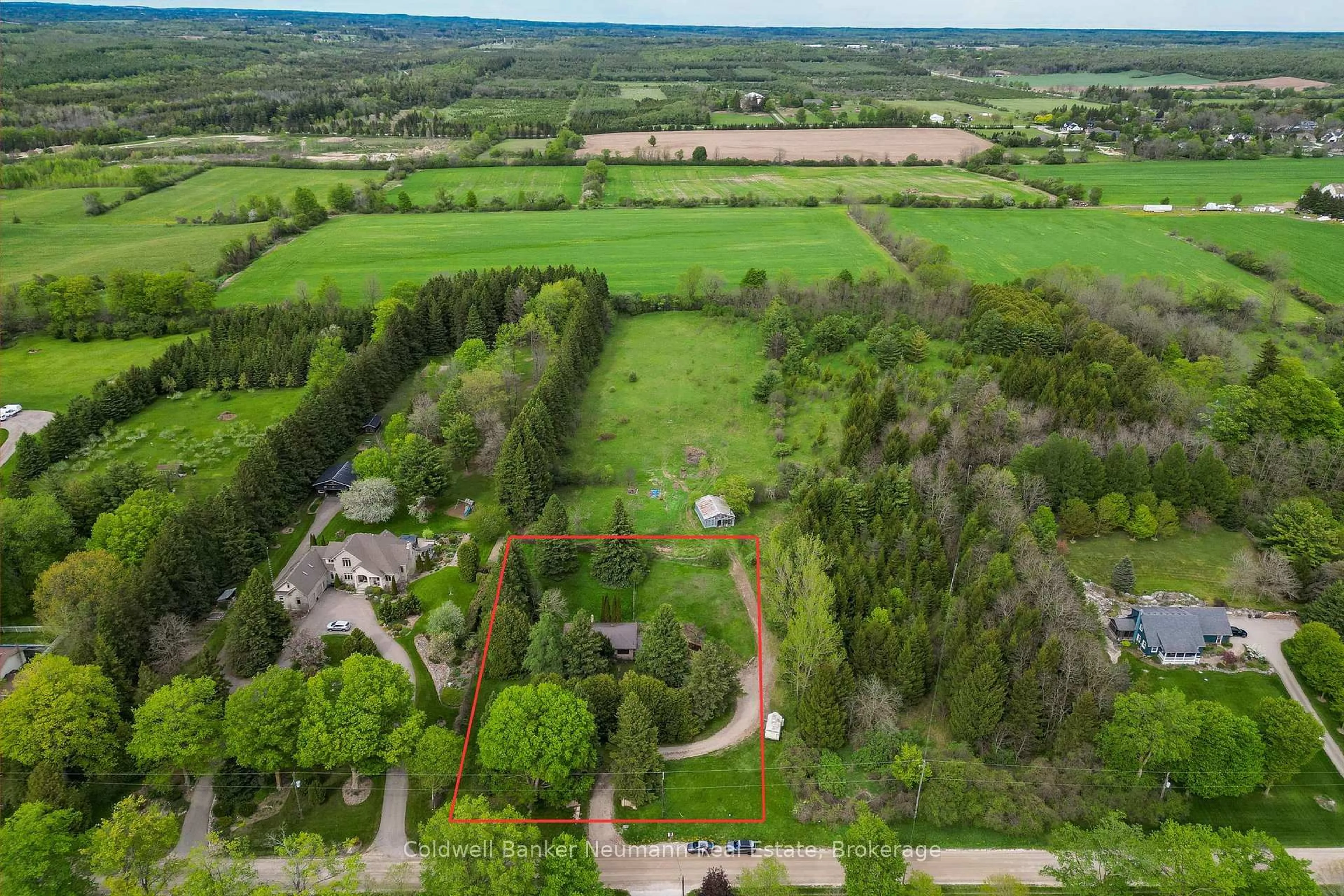 A pic from outside/outdoor area/front of a property/back of a property/a pic from drone, forest/trees view for 111 Carter Rd, Puslinch Ontario N1H 6H8