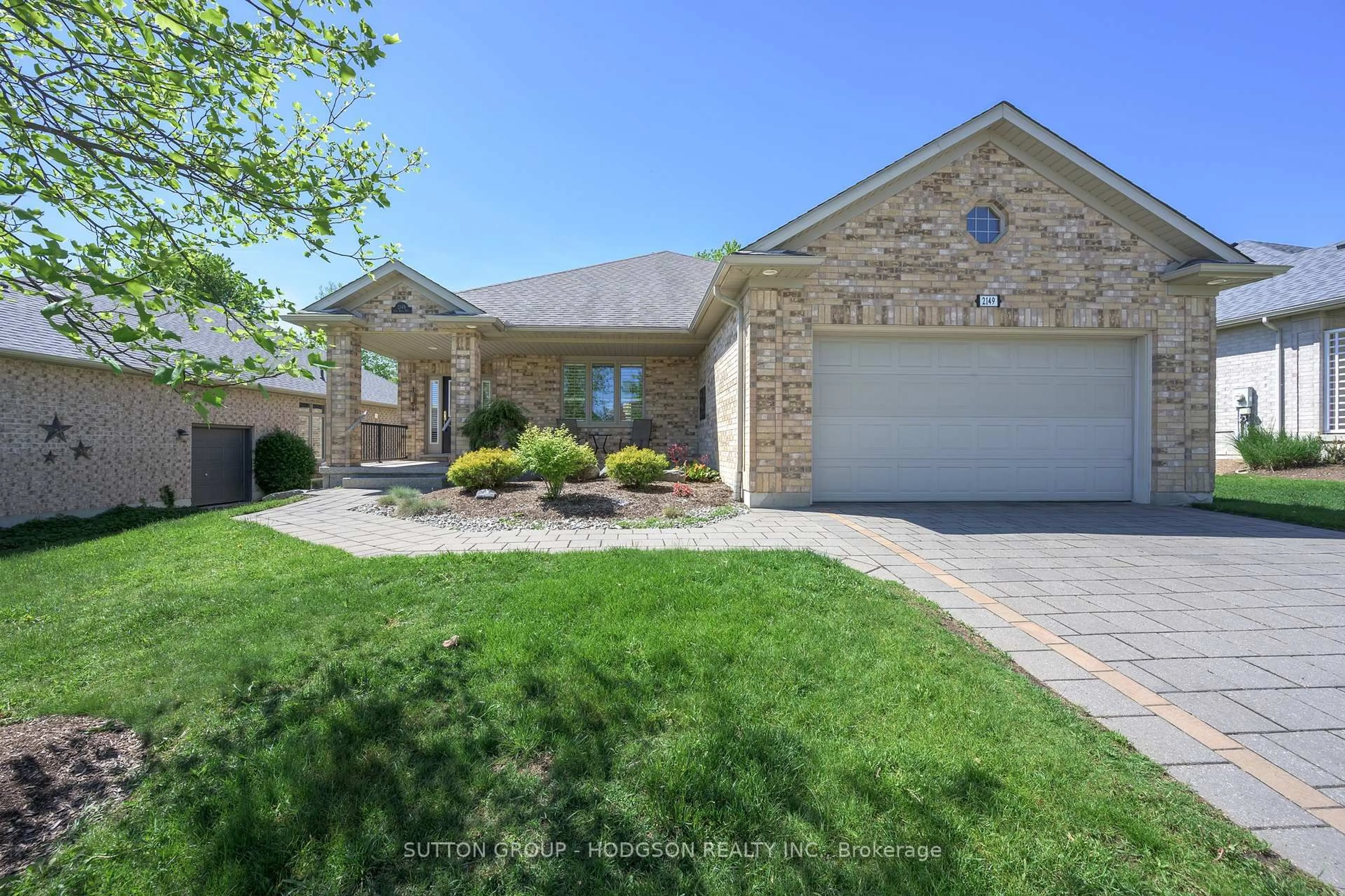Home with brick exterior material, street for 2149 Jack Nash Dr, London South Ontario N6K 5R1