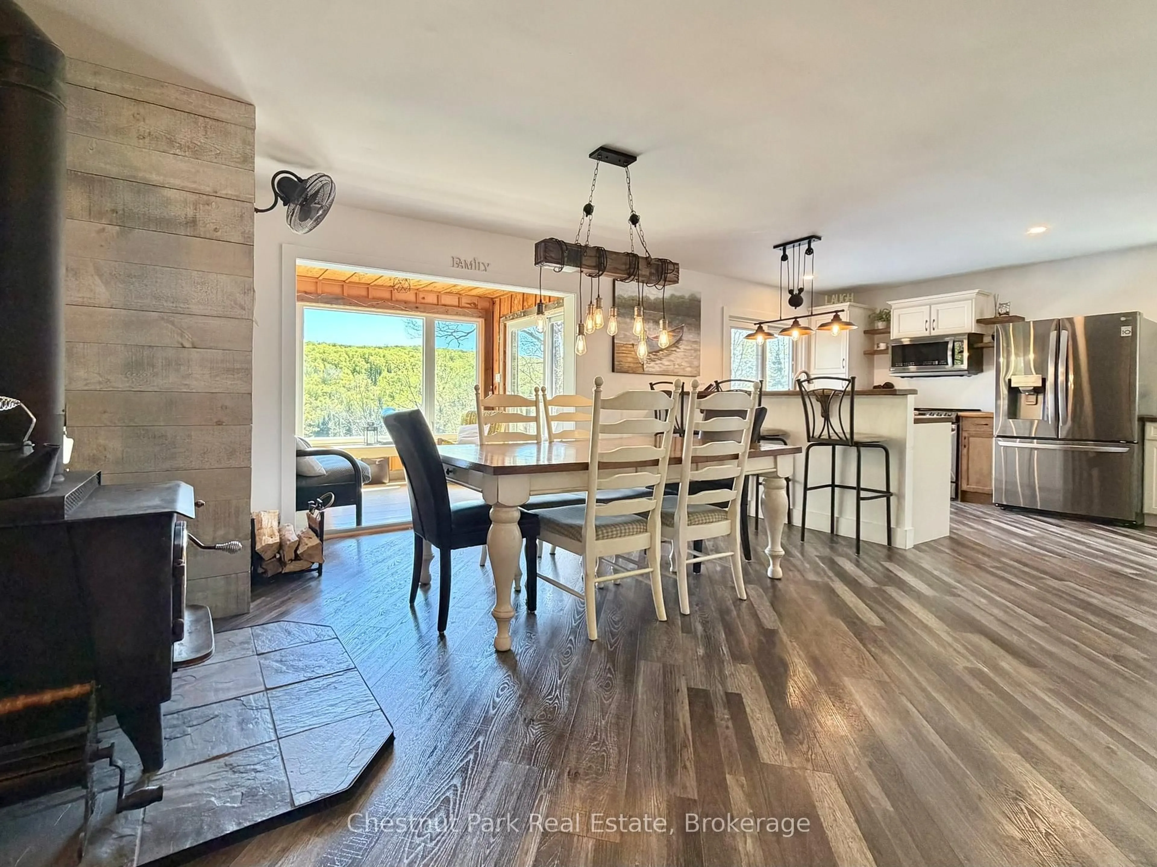 Open concept kitchen, wood/laminate floor for 1027 Select Tr, Dysart et al Ontario K0M 1S0
