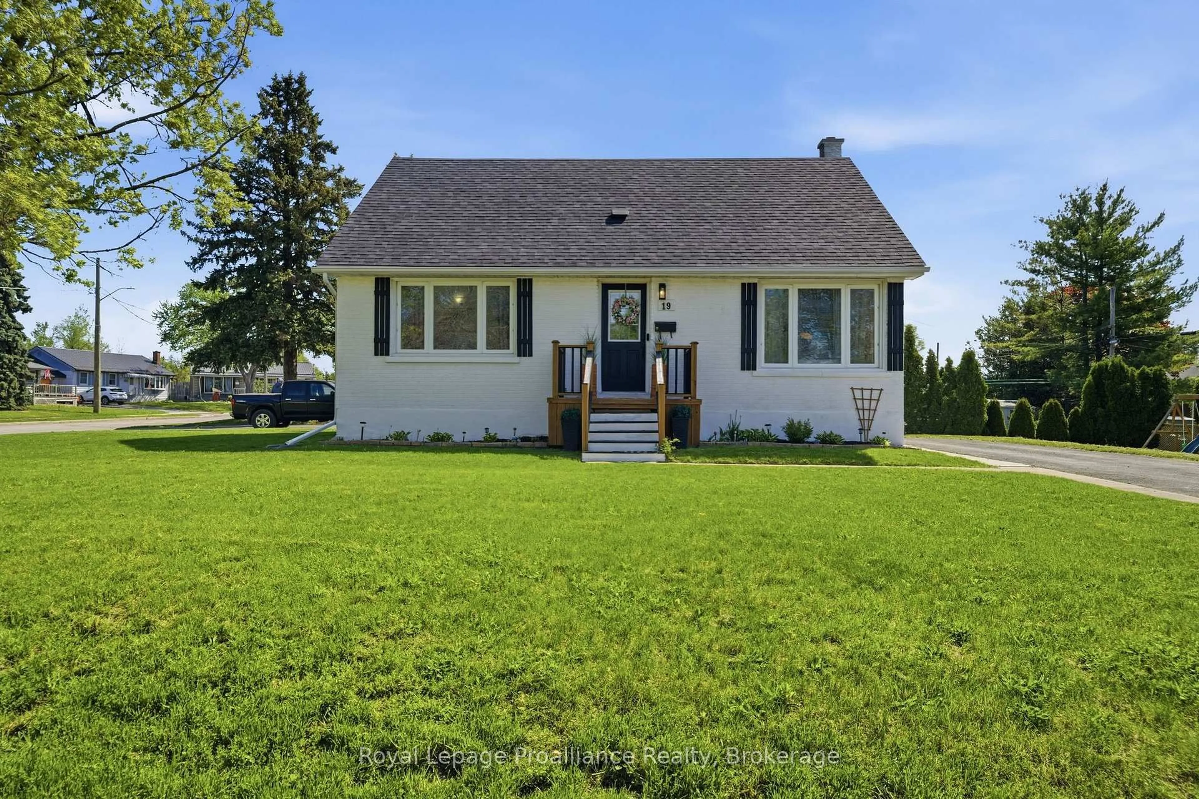 Home with vinyl exterior material, street for 19 Coleman Dr, Quinte West Ontario K8V 3A5