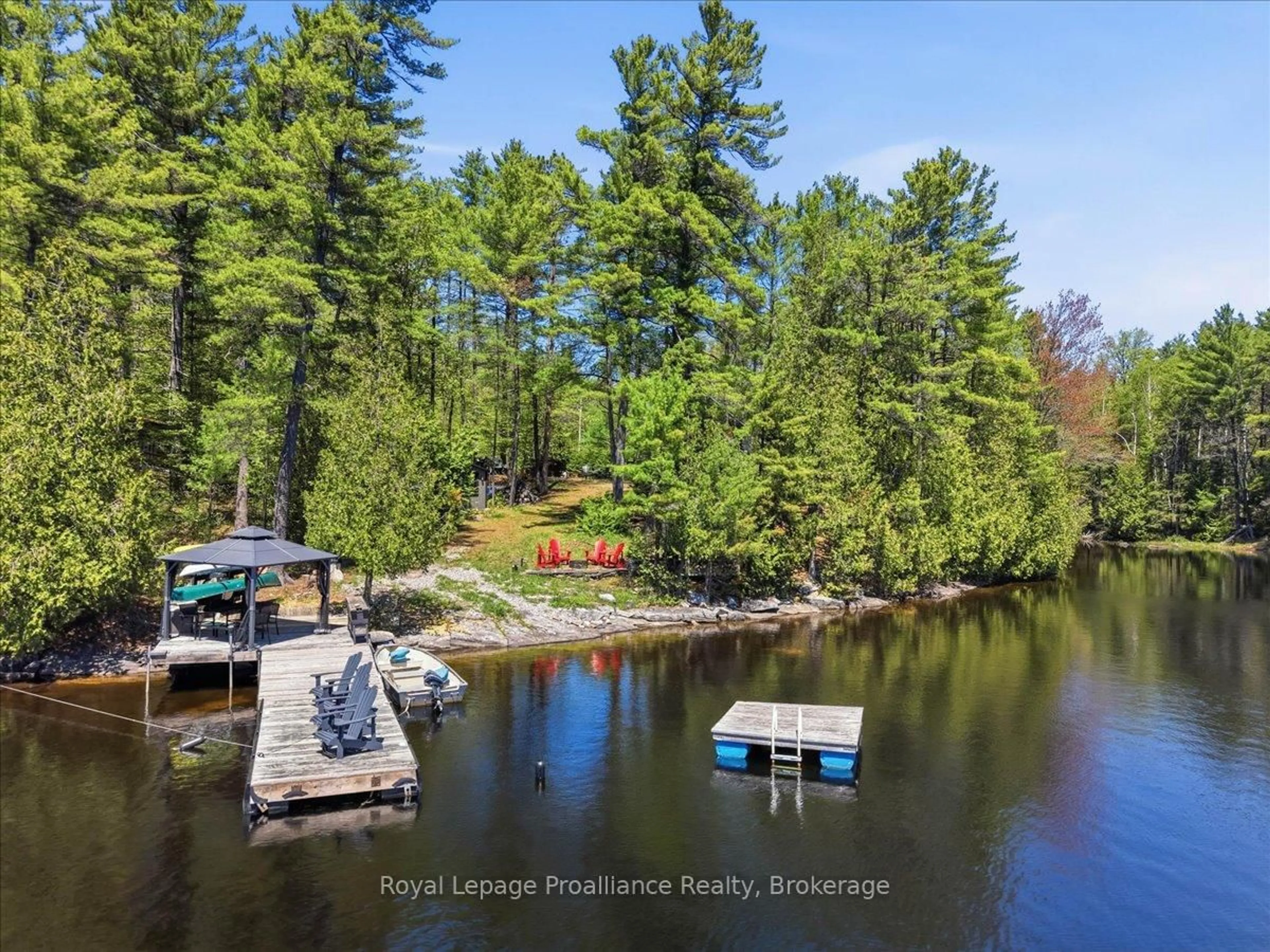 A pic from outside/outdoor area/front of a property/back of a property/a pic from drone, water/lake/river/ocean view for 2134 Beach Rd, Plevna Ontario K0H 2M0