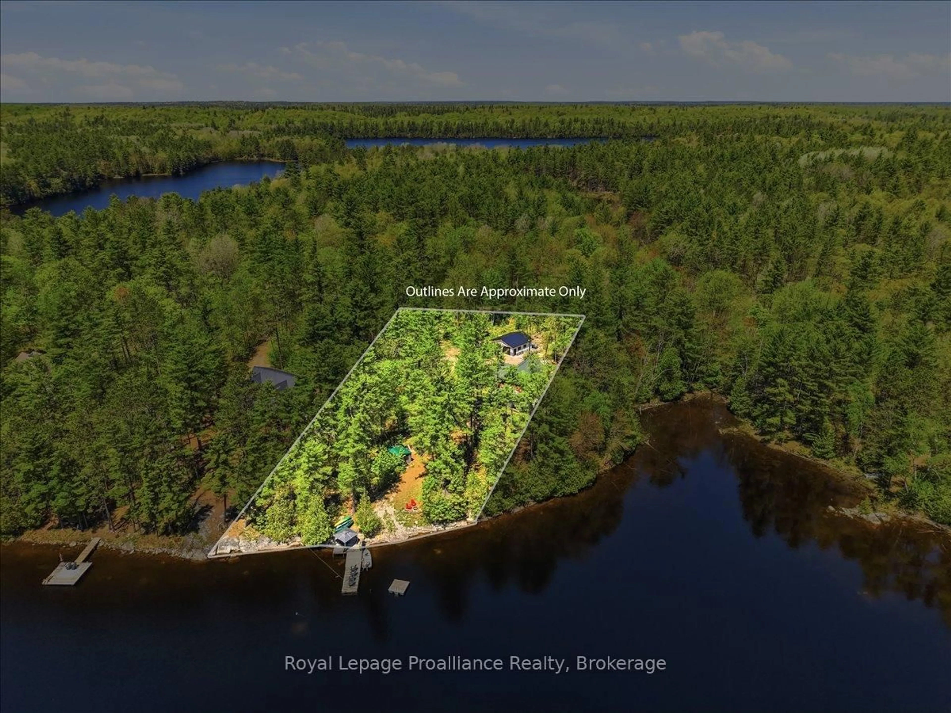 A pic from outside/outdoor area/front of a property/back of a property/a pic from drone, water/lake/river/ocean view for 2134 Beach Rd, Plevna Ontario K0H 2M0