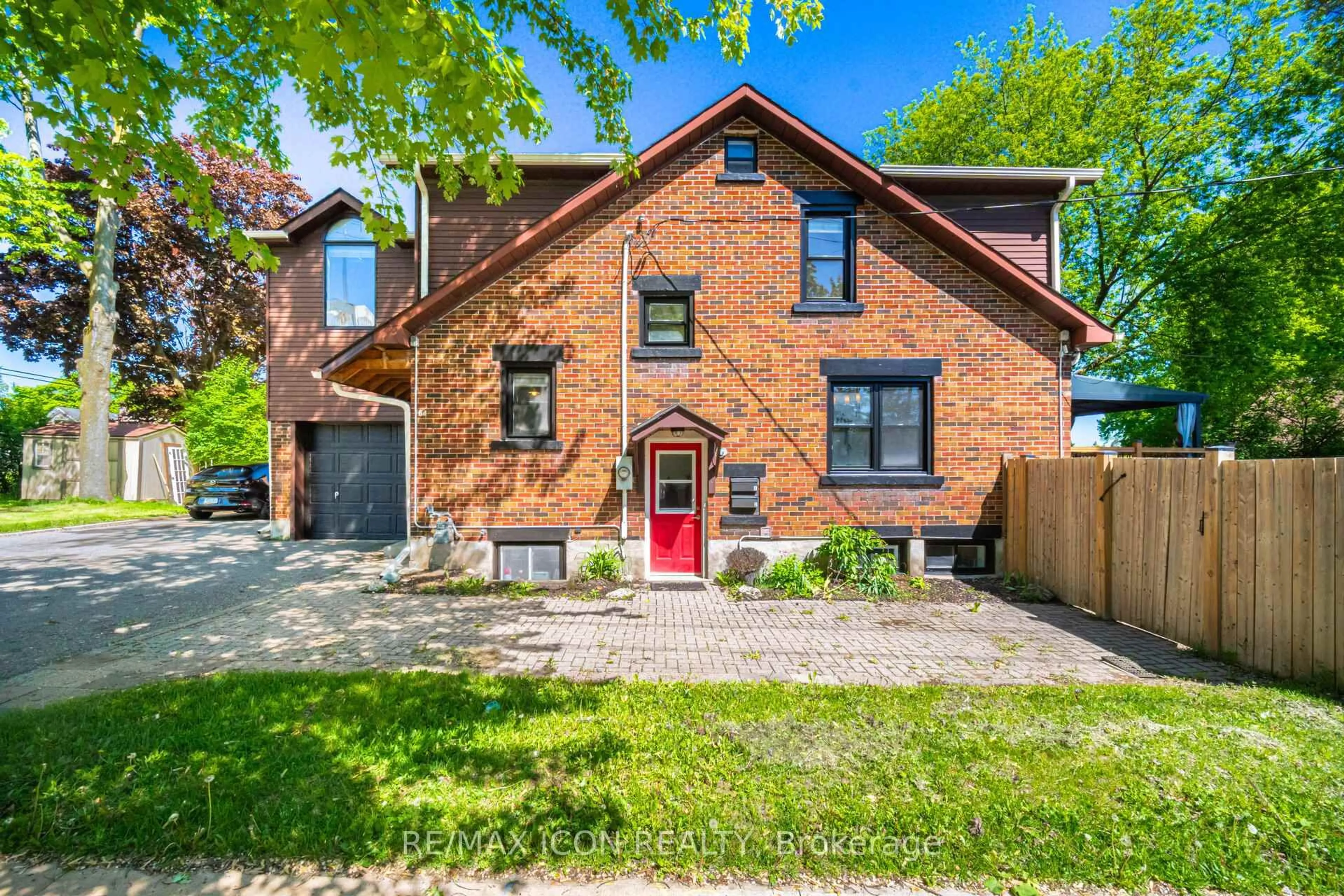 Home with brick exterior material, street for 64 Sheldon Ave, Kitchener Ontario N2H 3M4