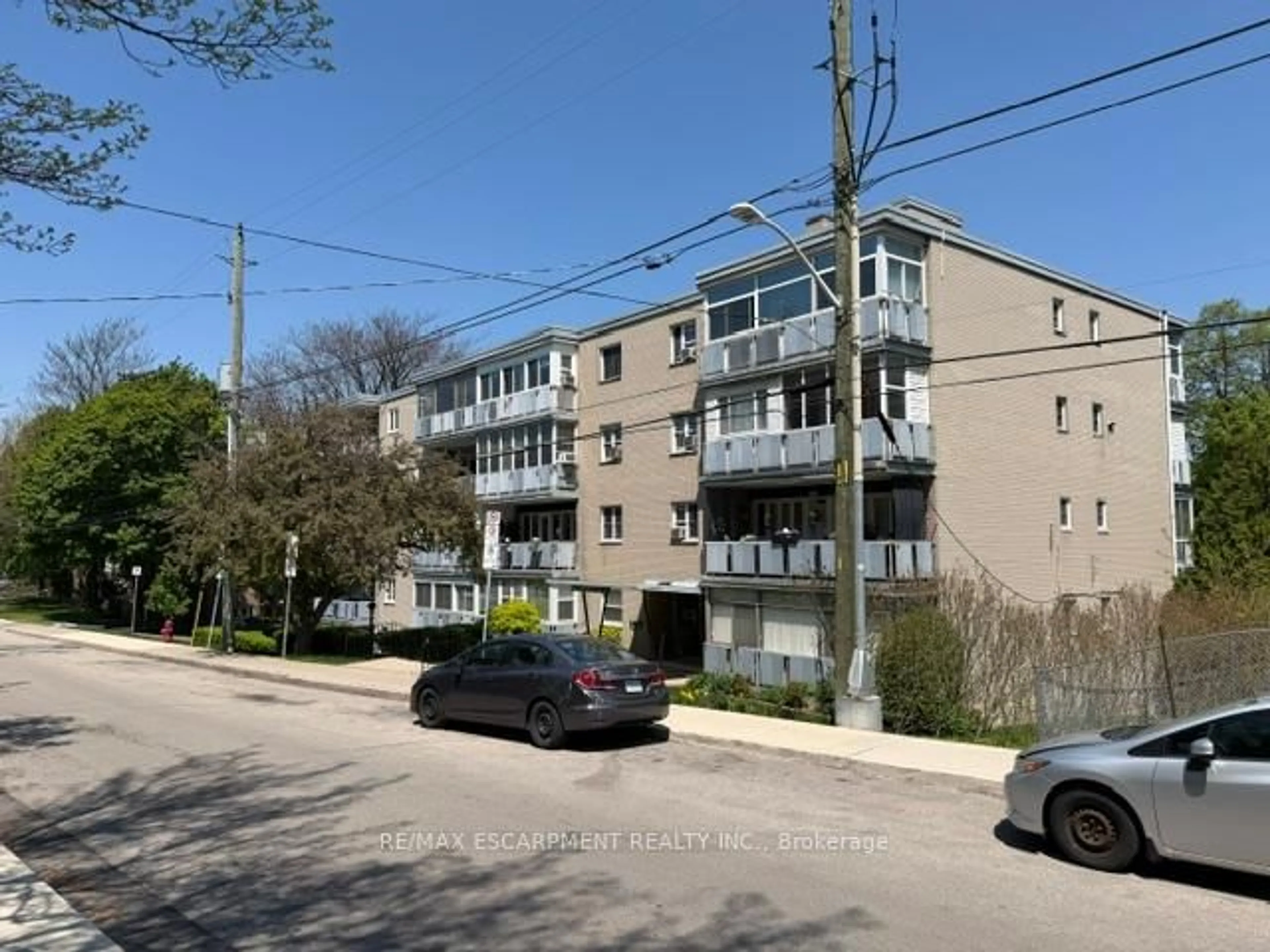 A pic from outside/outdoor area/front of a property/back of a property/a pic from drone, street for 107 St. Joseph's Dr #404, Hamilton Ontario L8N 2G1