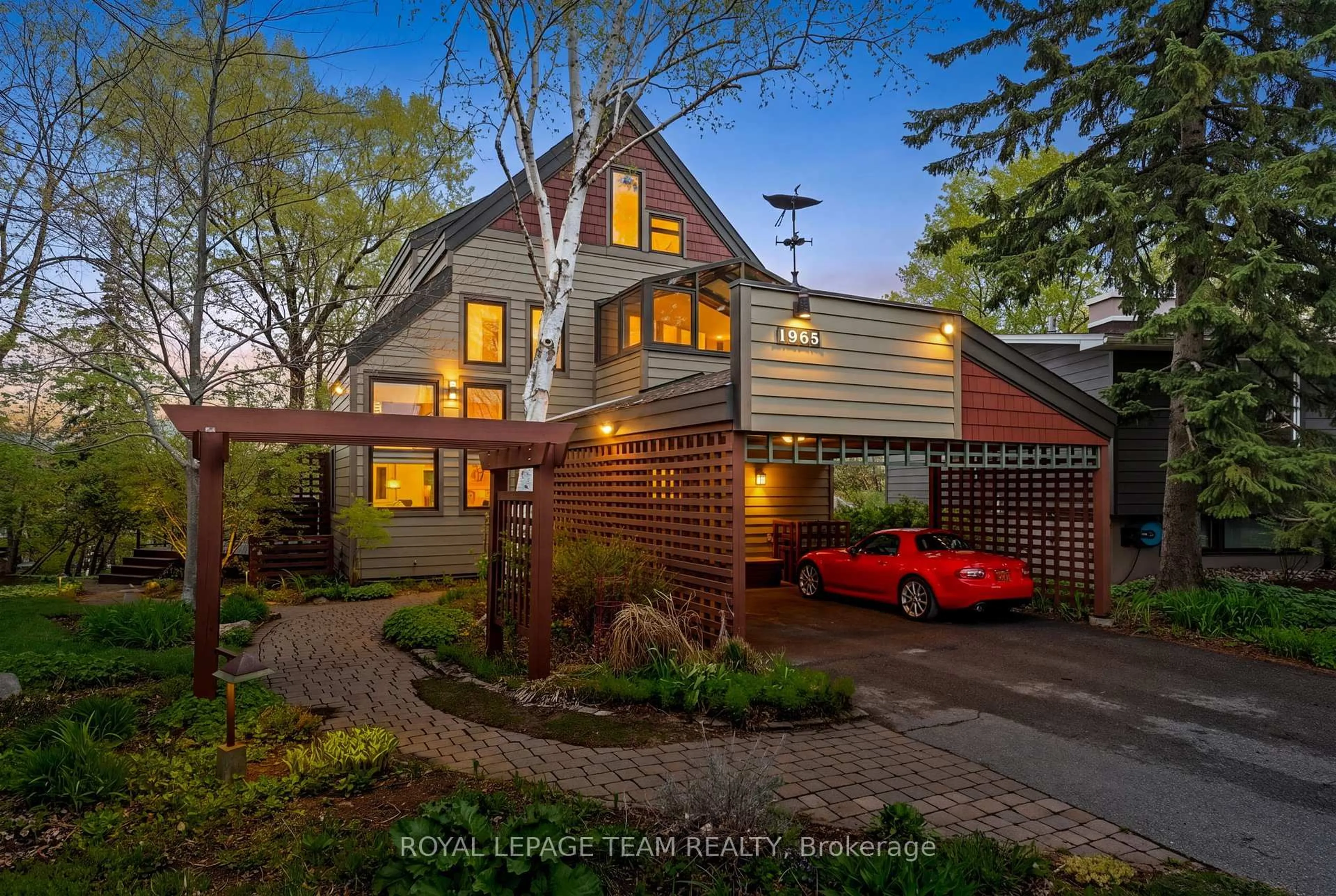 Home with brick exterior material, street for 1965 Bromley Rd, Ottawa Ontario K2A 1C3