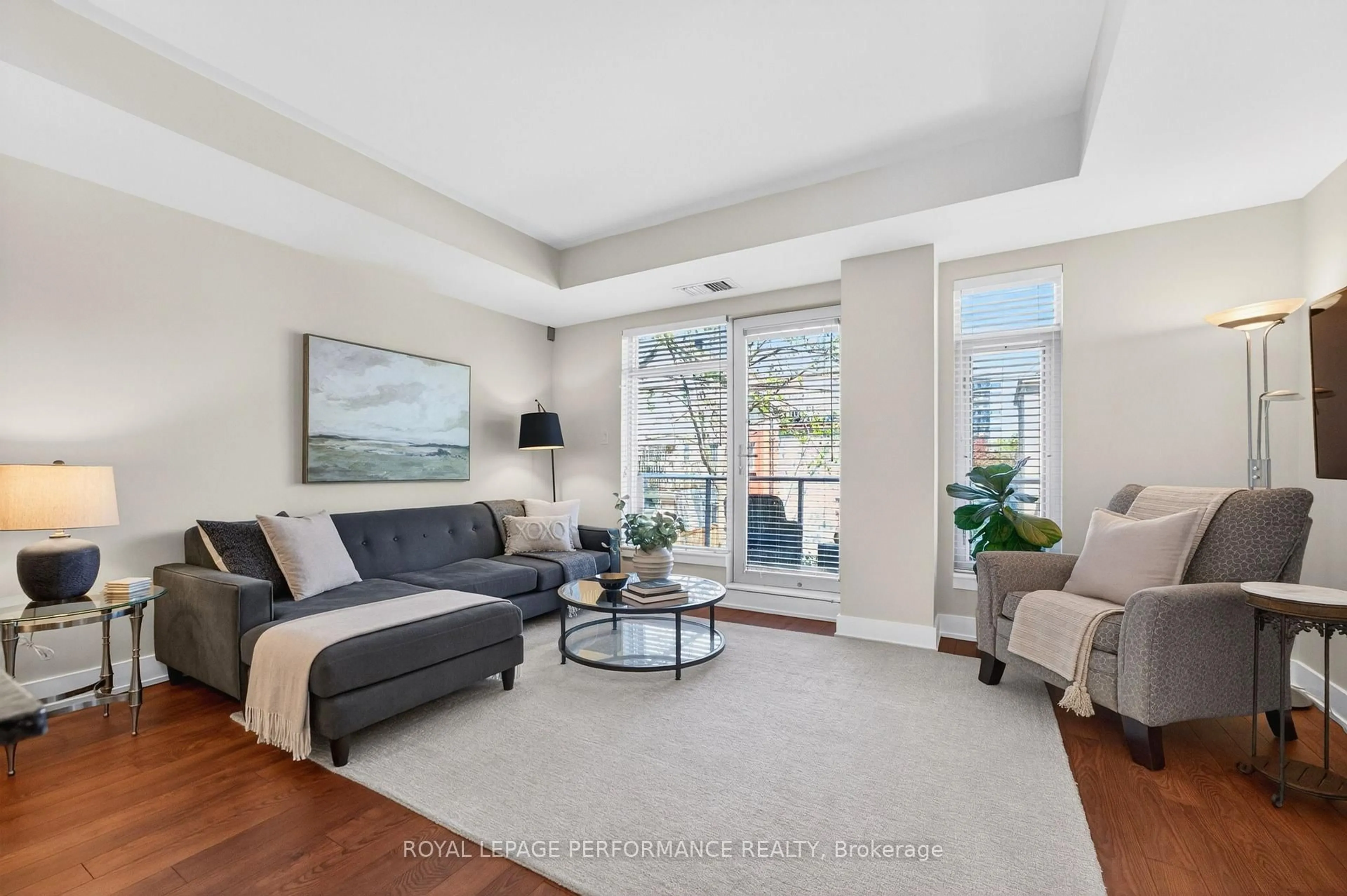 Living room with furniture, unknown for 131 Holland Ave #203, Ottawa Ontario K1Y 3A2