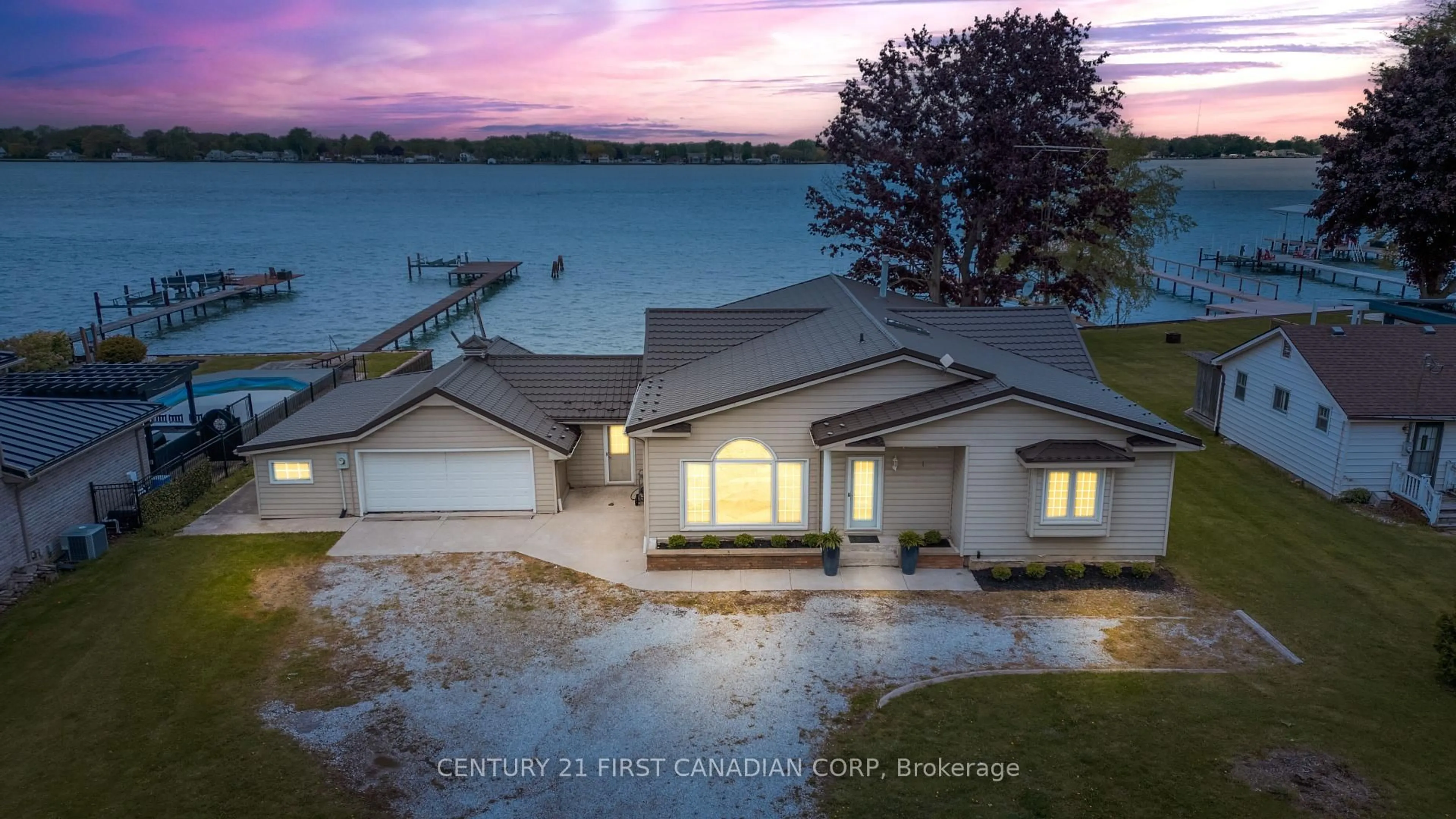 A pic from outside/outdoor area/front of a property/back of a property/a pic from drone, water/lake/river/ocean view for 3877 St Clair Pkwy, St. Clair Ontario N0P 2B0