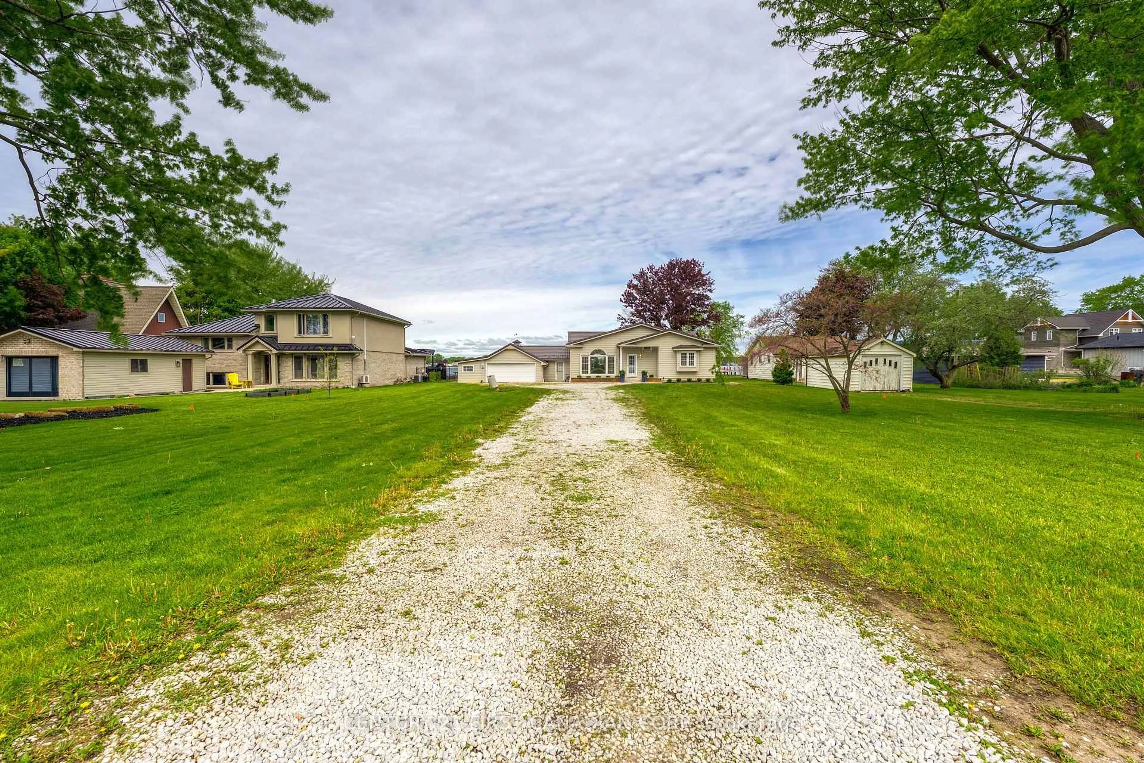 A pic from outside/outdoor area/front of a property/back of a property/a pic from drone, street for 3877 St Clair Pkwy, St. Clair Ontario N0P 2B0