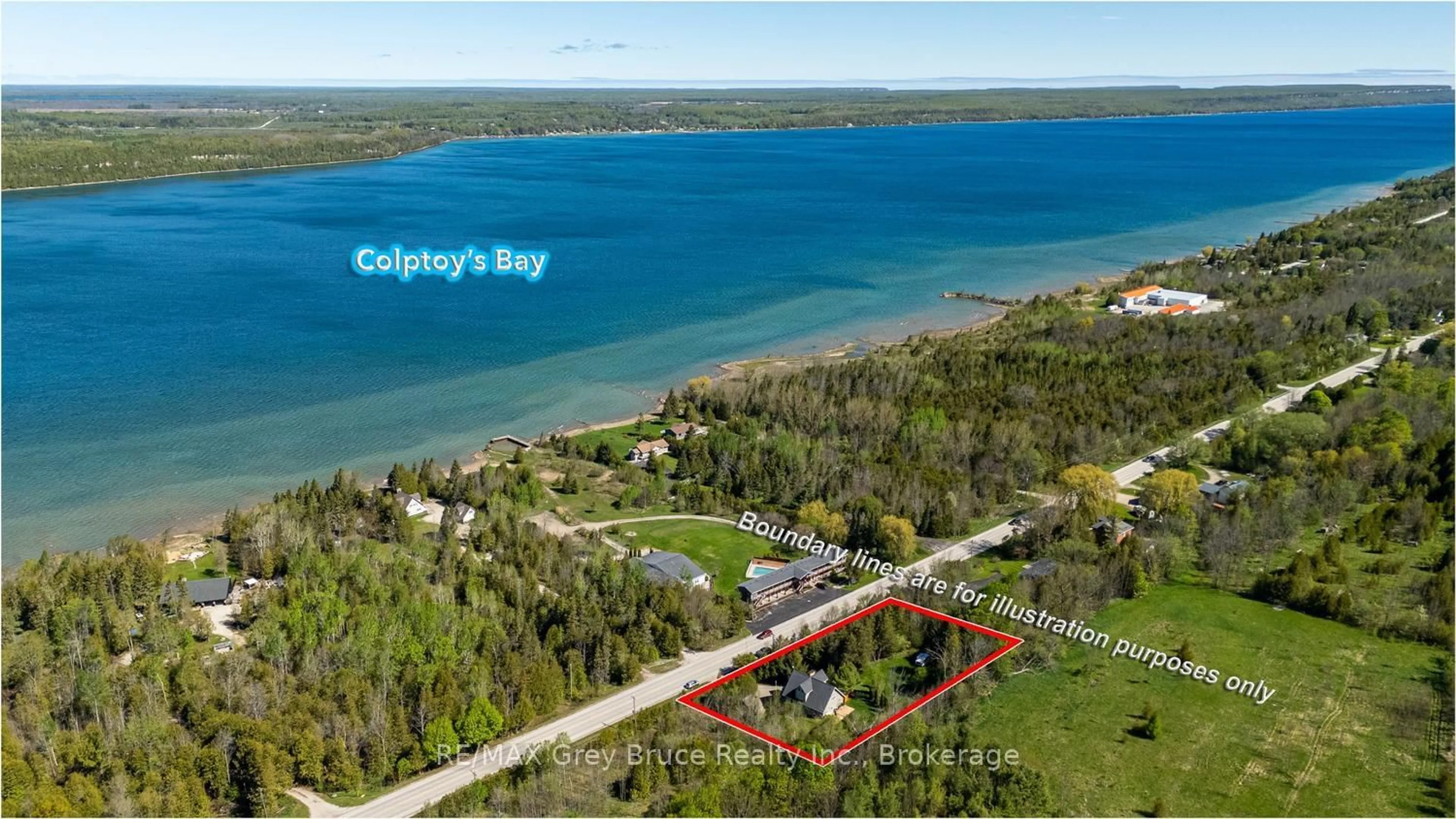 A pic from outside/outdoor area/front of a property/back of a property/a pic from drone, water/lake/river/ocean view for 501192 Grey 1 Rd, Georgian Bluffs Ontario N0H 2T0