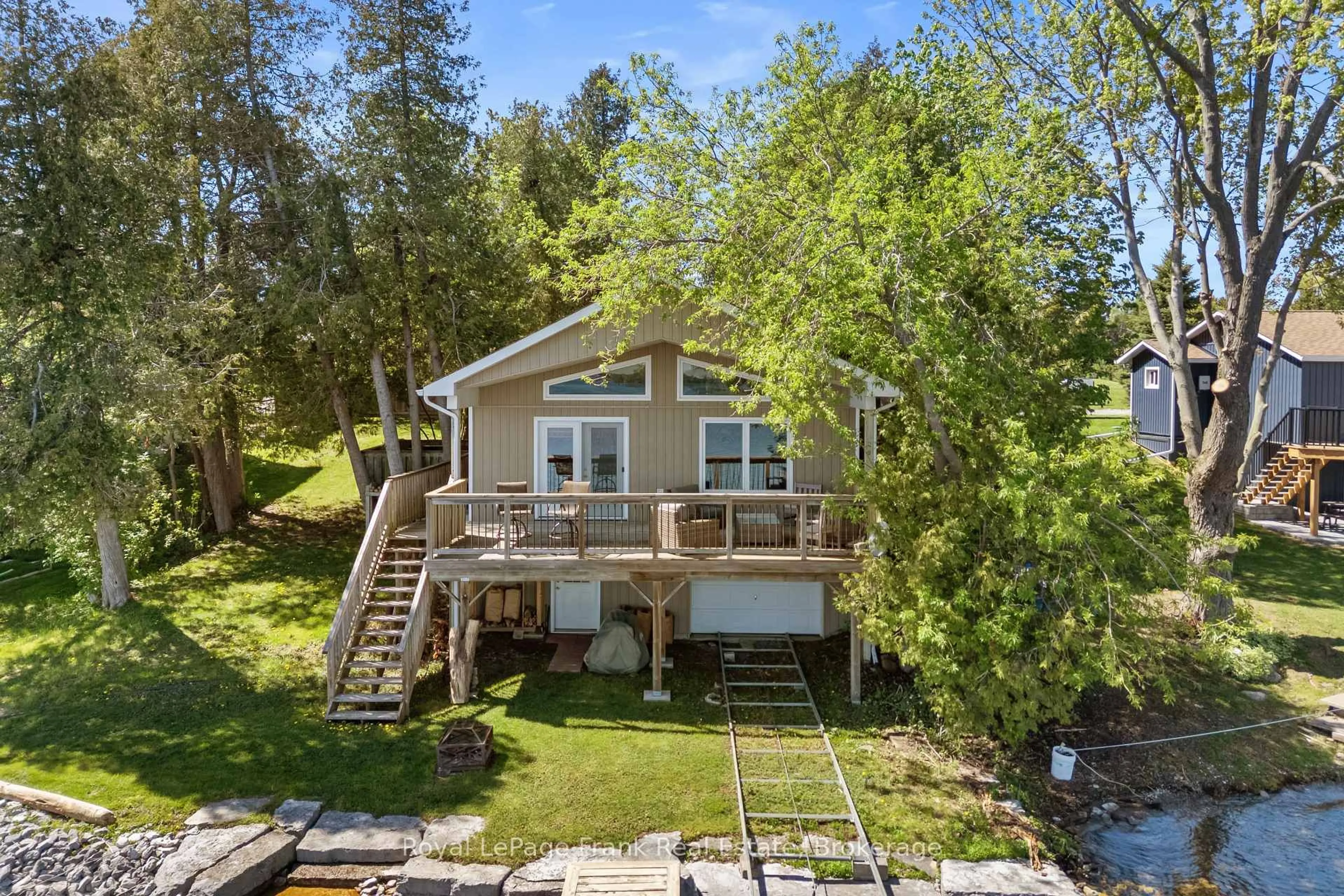 A pic from outside/outdoor area/front of a property/back of a property/a pic from drone, water/lake/river/ocean view for 71 Rainbow Rd, Kawartha Lakes Ontario K0M 1N0