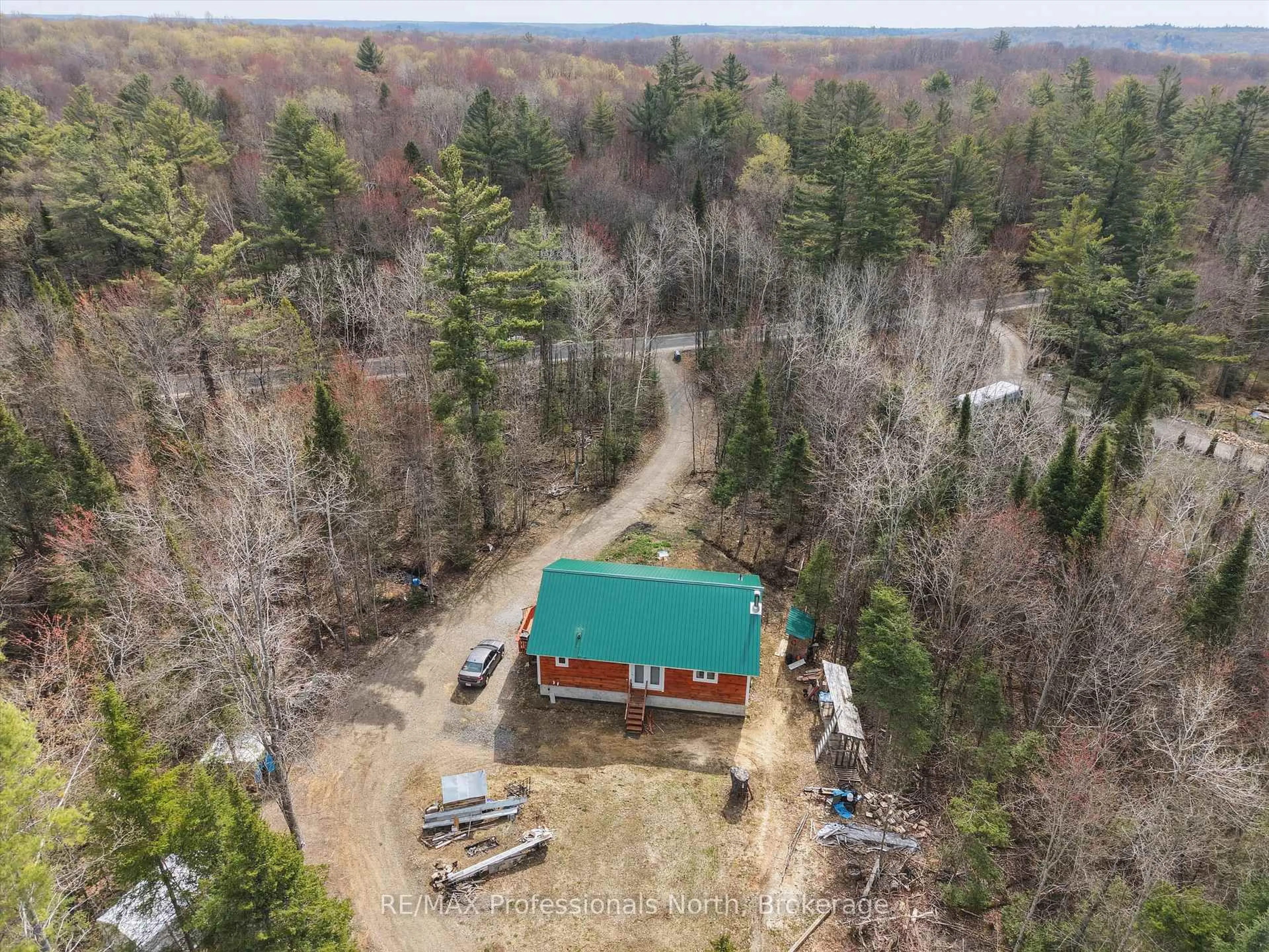 A pic from outside/outdoor area/front of a property/back of a property/a pic from drone, forest/trees view for 1070 Vankoughnet Rd, Bracebridge Ontario P1L 1X1