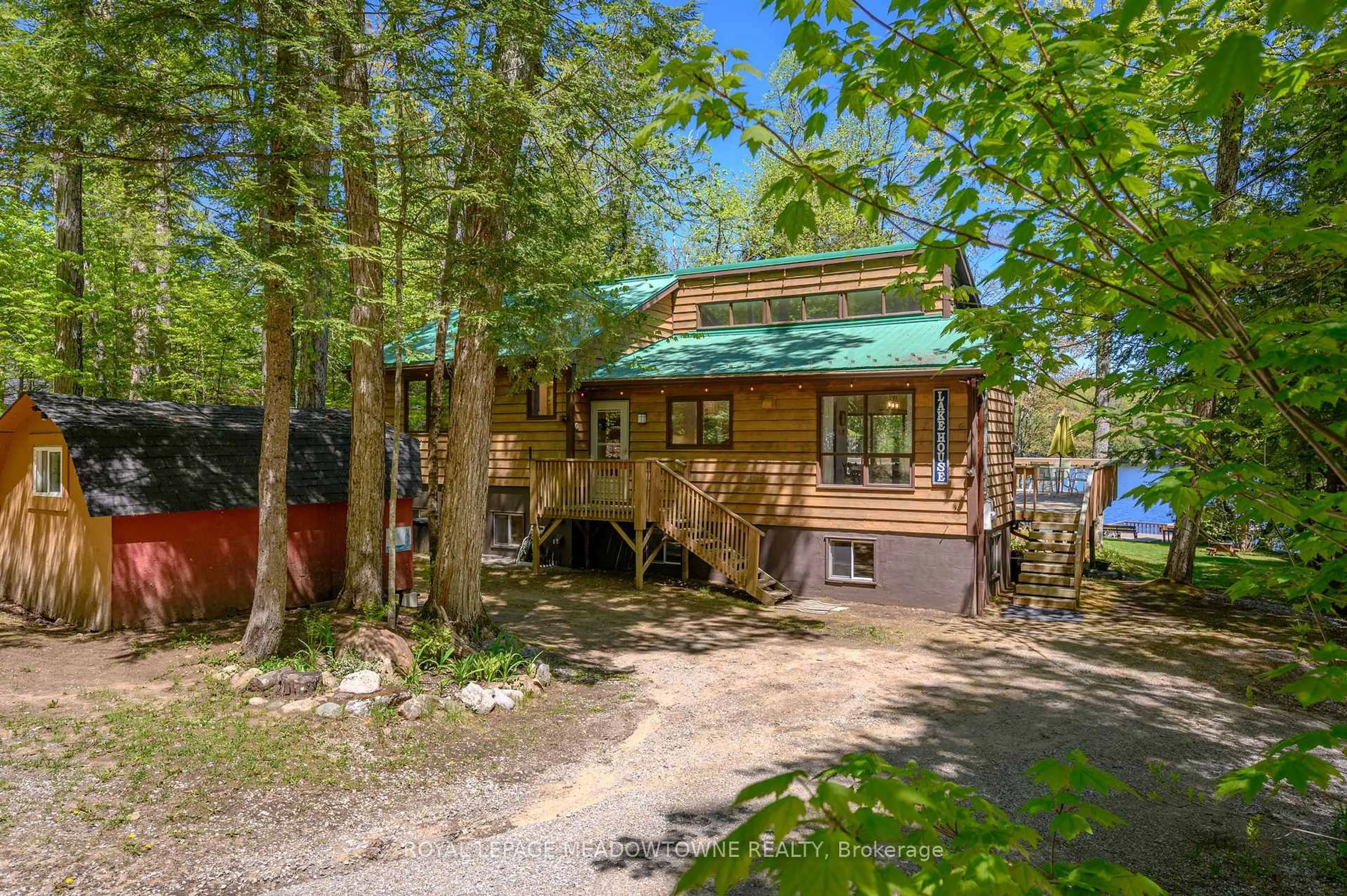 A pic from outside/outdoor area/front of a property/back of a property/a pic from drone, forest/trees view for 19 Fire Rte #251a, Trent Lakes Ontario K0L 1J0
