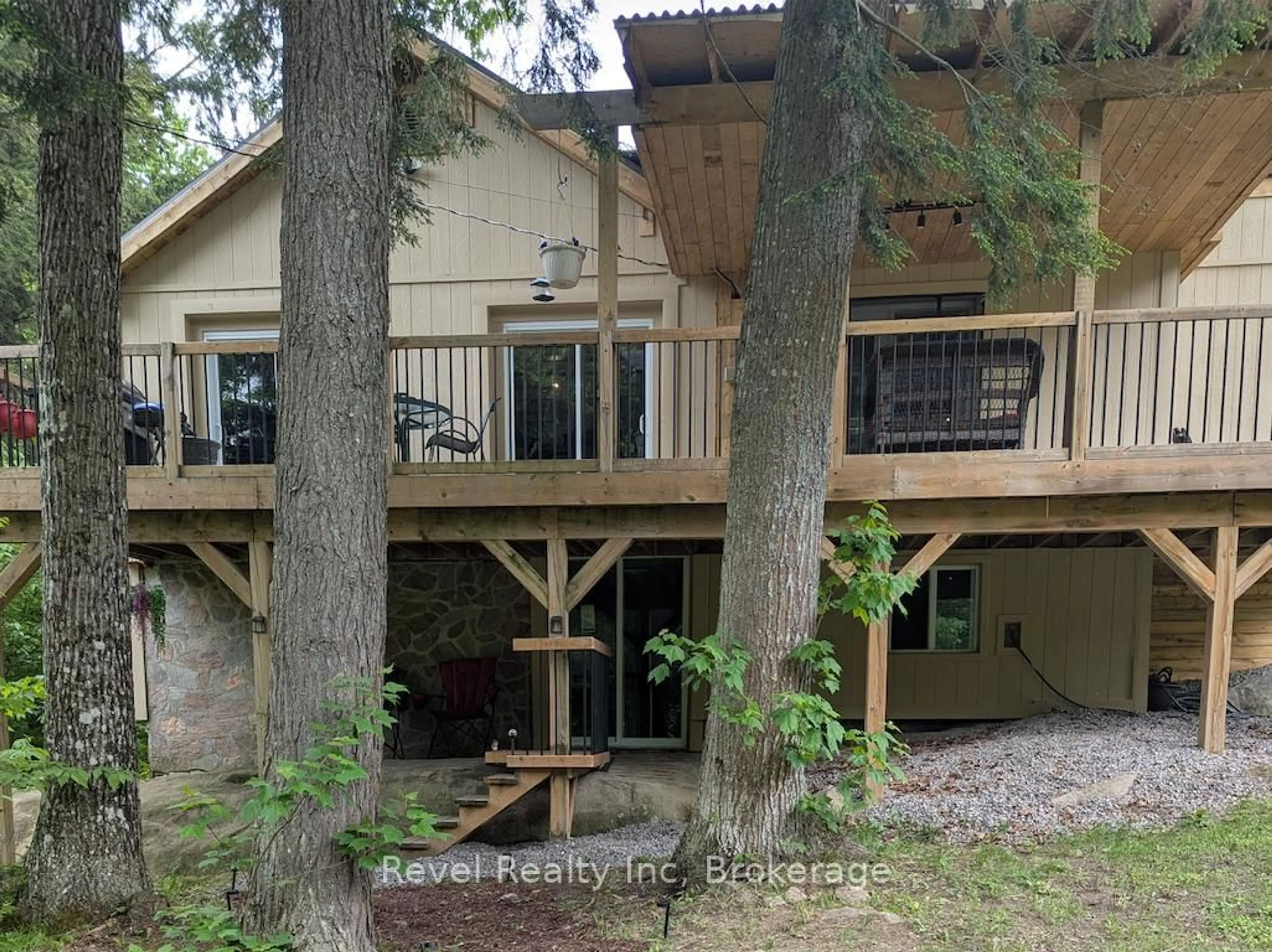 A pic from outside/outdoor area/front of a property/back of a property/a pic from drone, forest/trees view for 22 Camp Rd, McKellar Ontario P2A 0B4