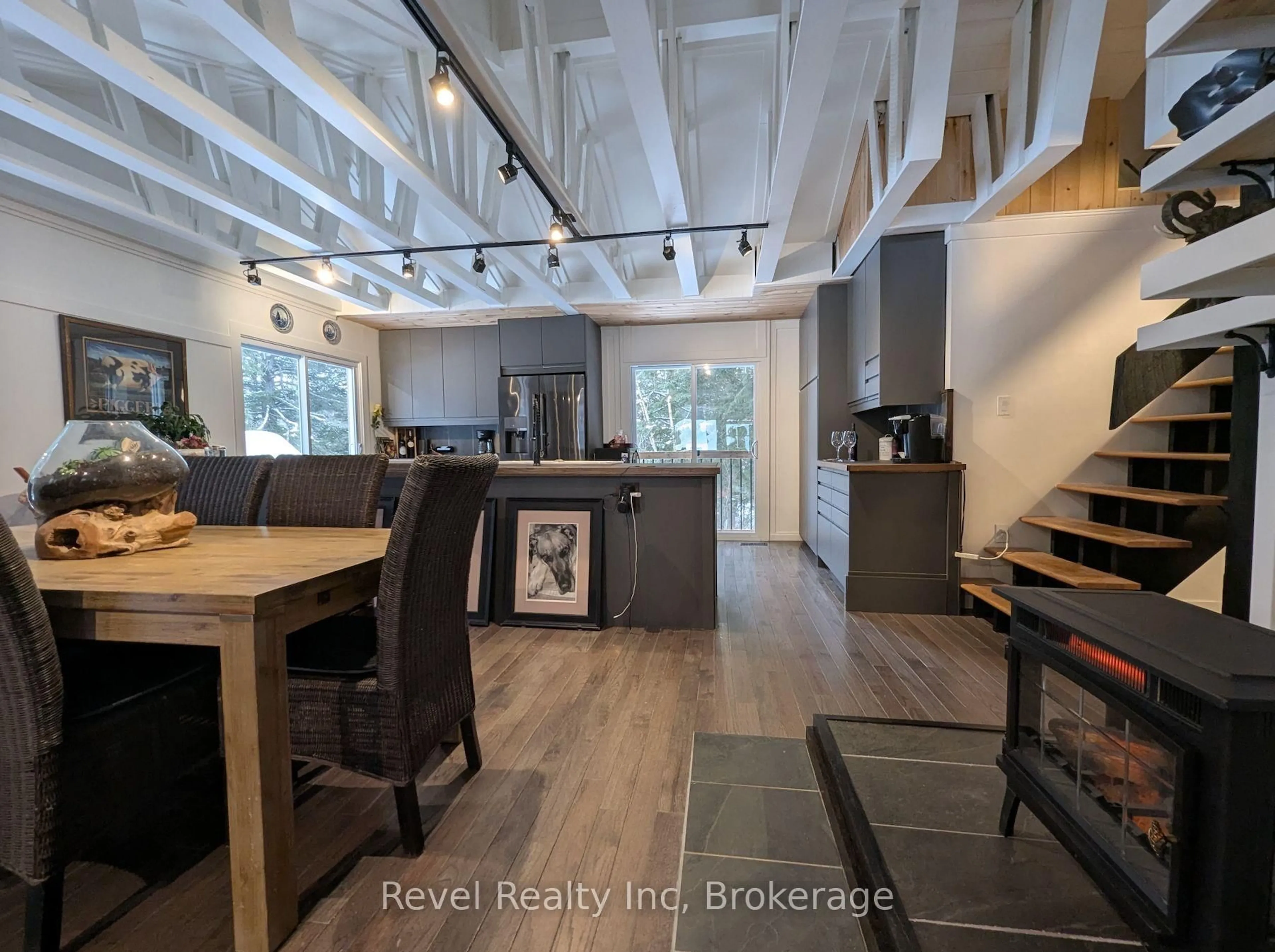 Open concept kitchen, wood/laminate floor for 22 Camp Rd, McKellar Ontario P2A 0B4