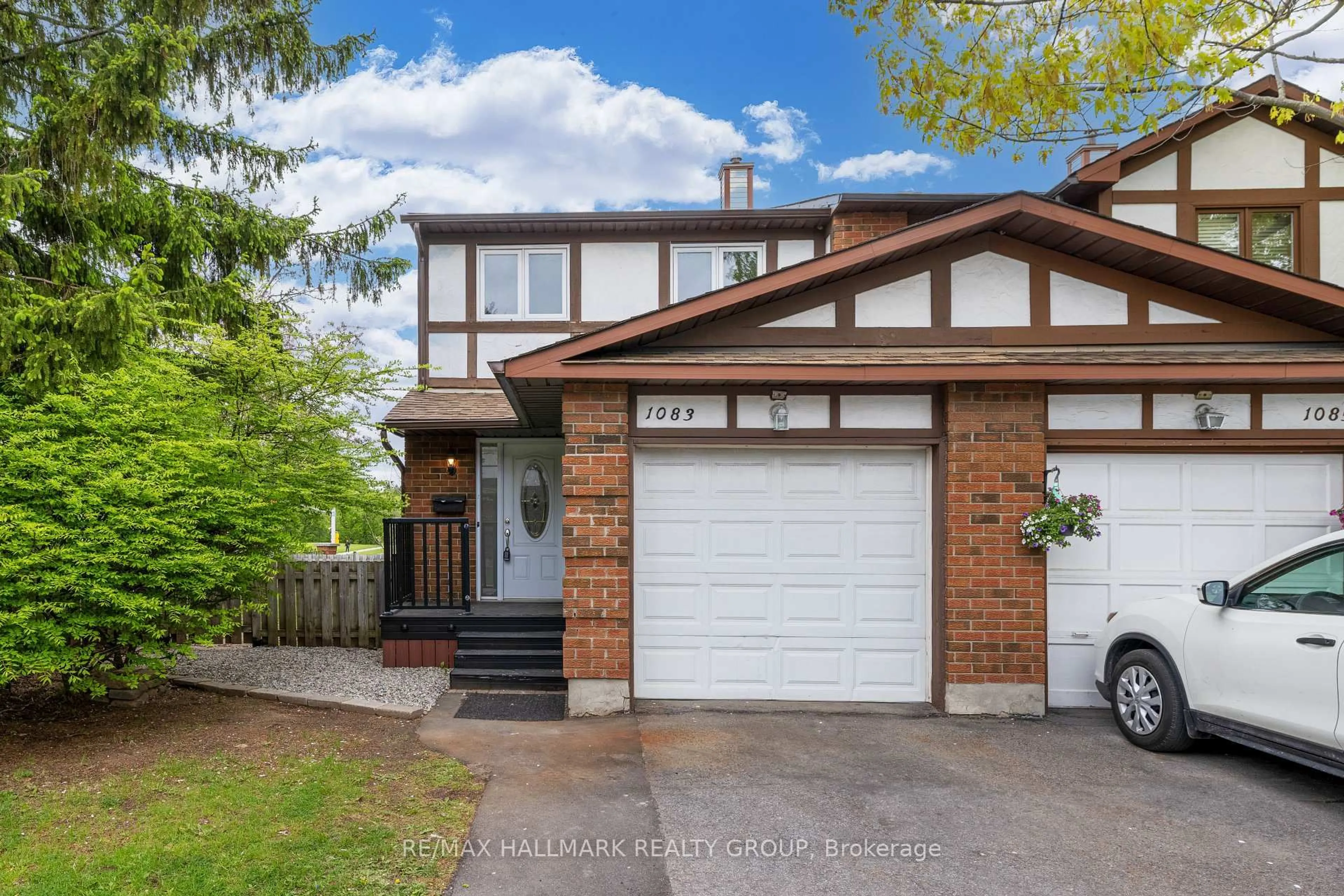 Home with brick exterior material, street for 1083 Millwood Crt, Orleans Ontario K1C 3E9