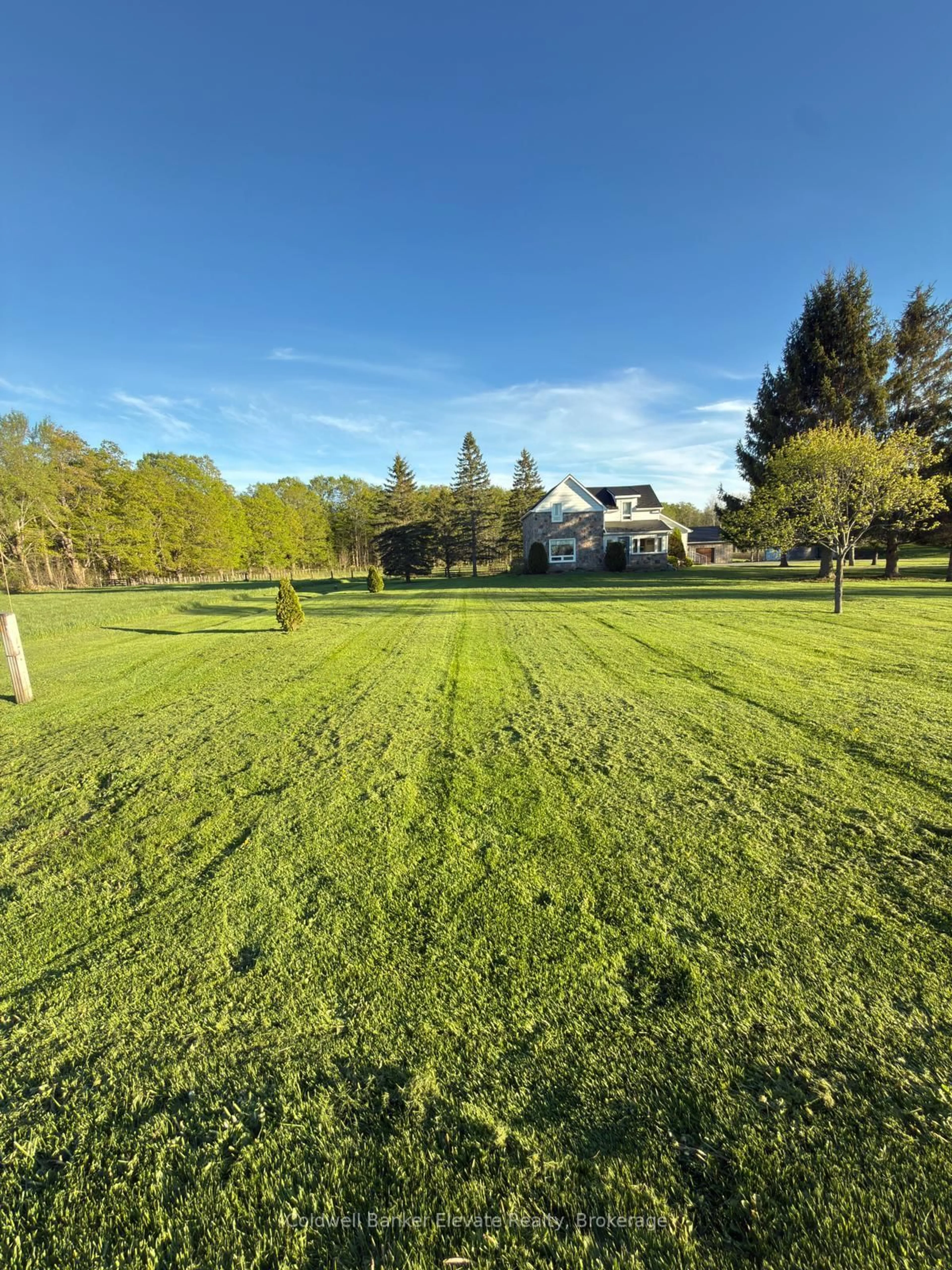 A pic from outside/outdoor area/front of a property/back of a property/a pic from drone, unknown for 441408 Concession 21, Georgian Bluffs Ontario N0H 2T0
