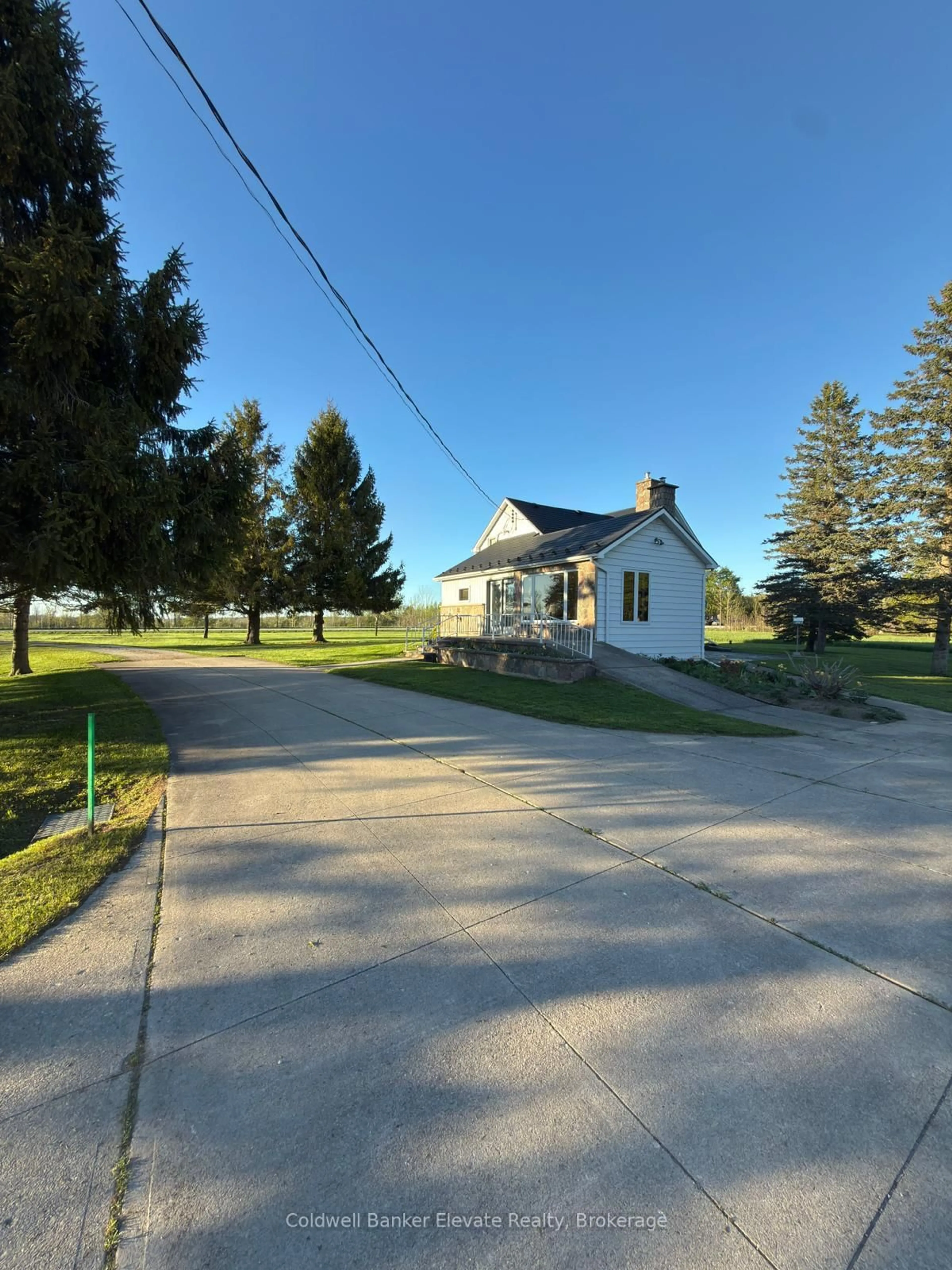 A pic from outside/outdoor area/front of a property/back of a property/a pic from drone, street for 441408 Concession 21, Georgian Bluffs Ontario N0H 2T0