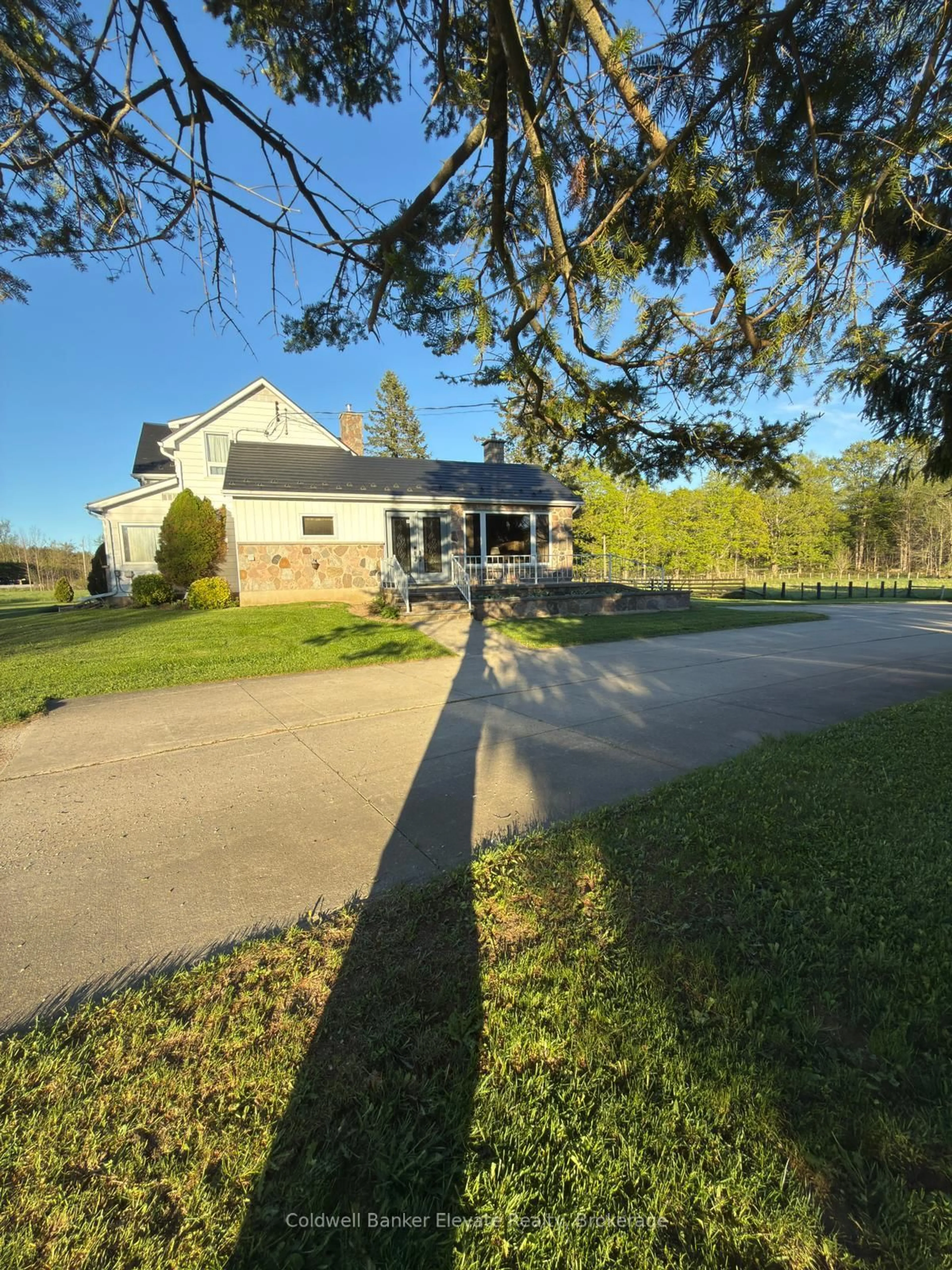 A pic from outside/outdoor area/front of a property/back of a property/a pic from drone, street for 441408 Concession 21, Georgian Bluffs Ontario N0H 2T0