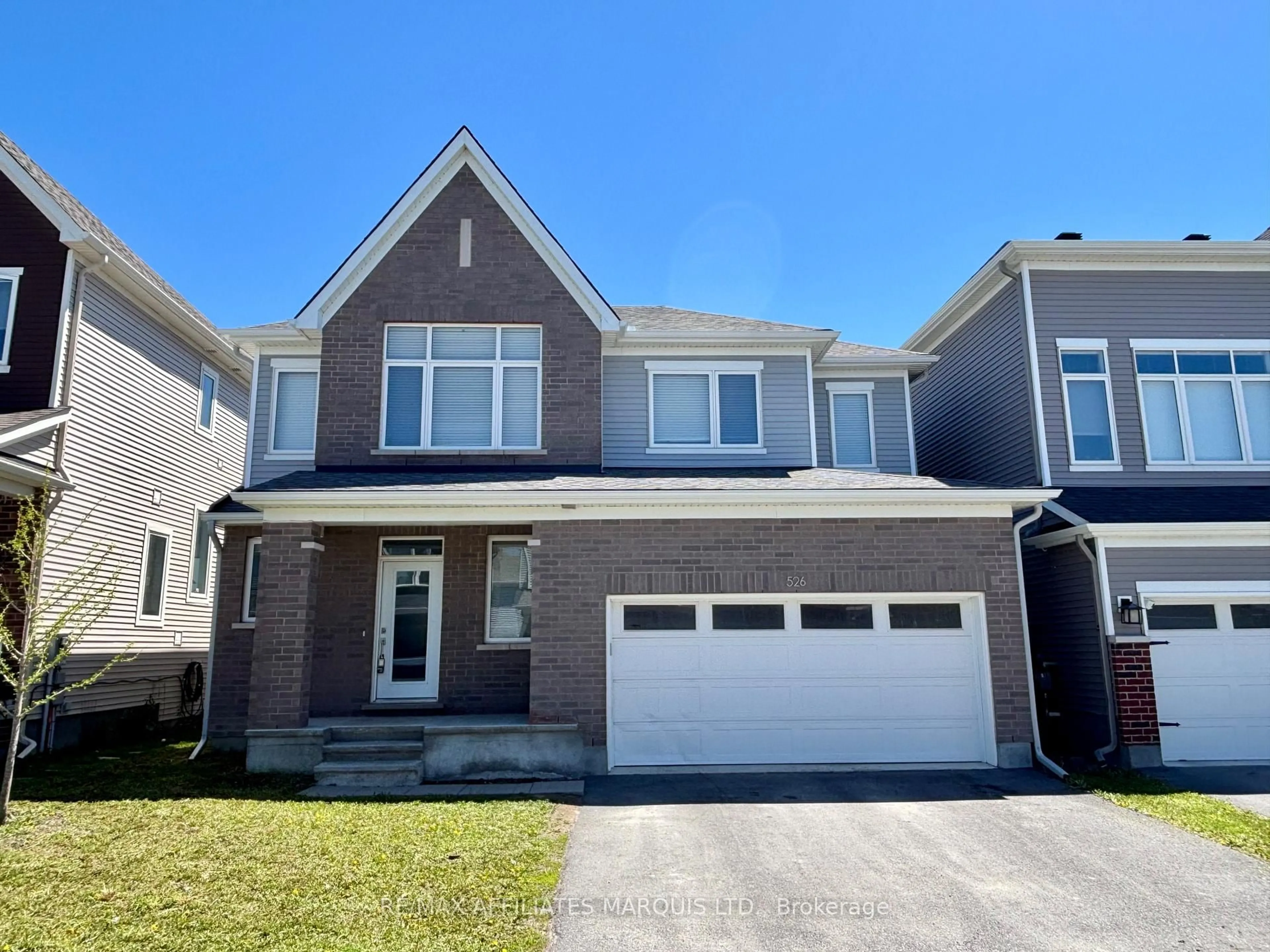 Home with vinyl exterior material, street for 526 Sturnidae St, Barrhaven Ontario K6J 6W9