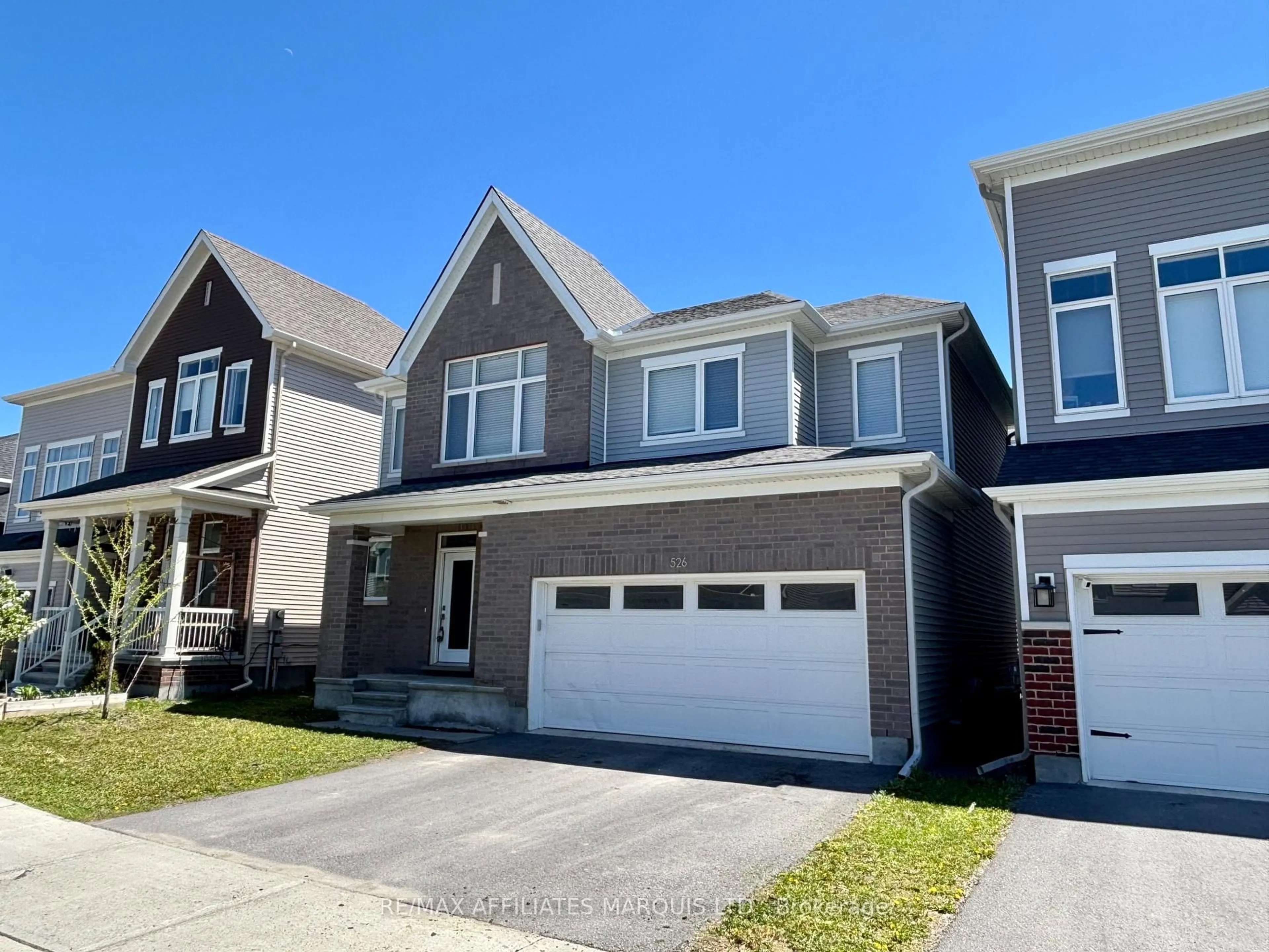 Home with vinyl exterior material, street for 526 Sturnidae St, Barrhaven Ontario K6J 6W9