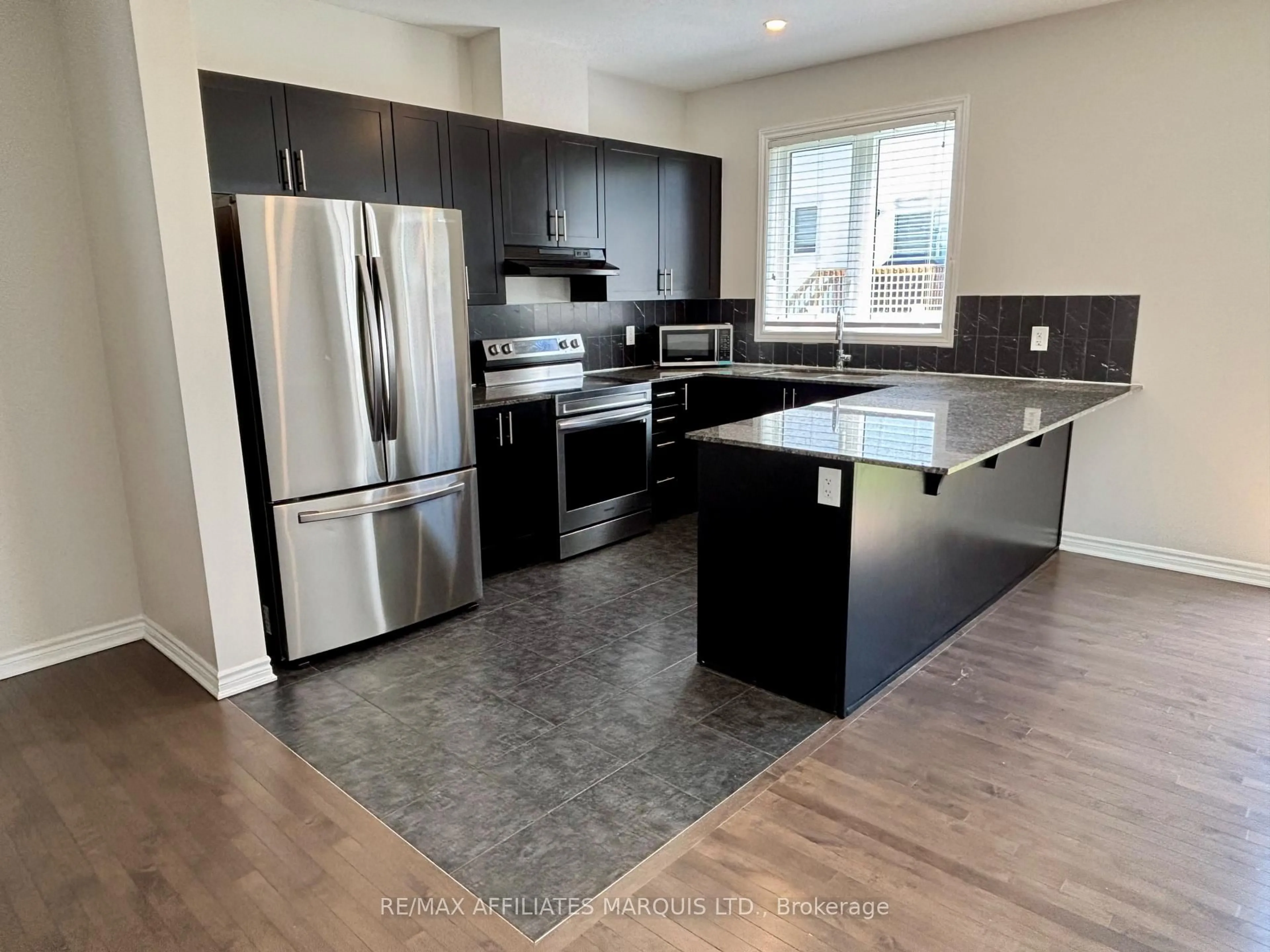 Open concept kitchen, unknown for 526 Sturnidae St, Barrhaven Ontario K6J 6W9