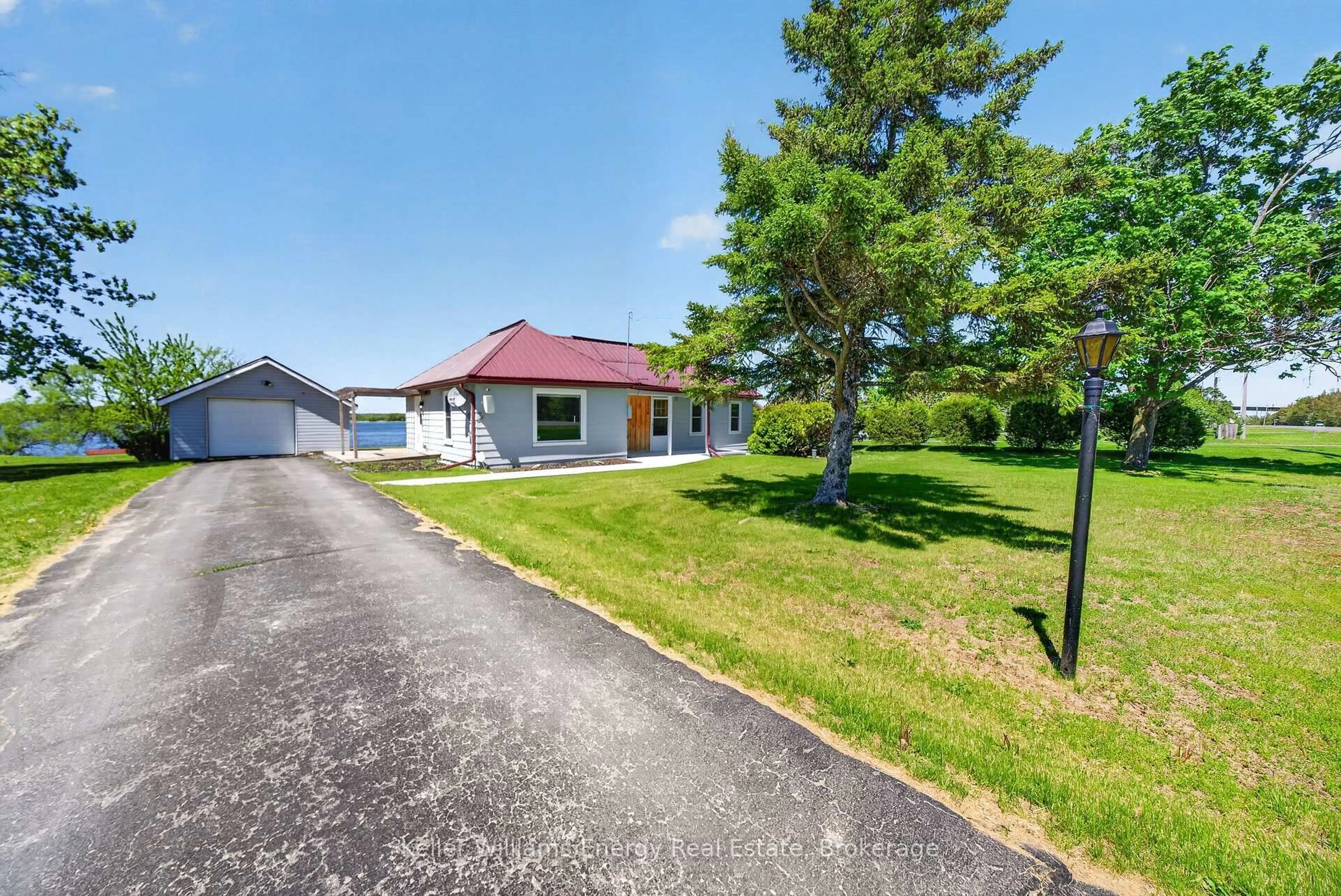 A pic from outside/outdoor area/front of a property/back of a property/a pic from drone, street for 1534 County Road 35, Prince Edward County Ontario K0K 2T0