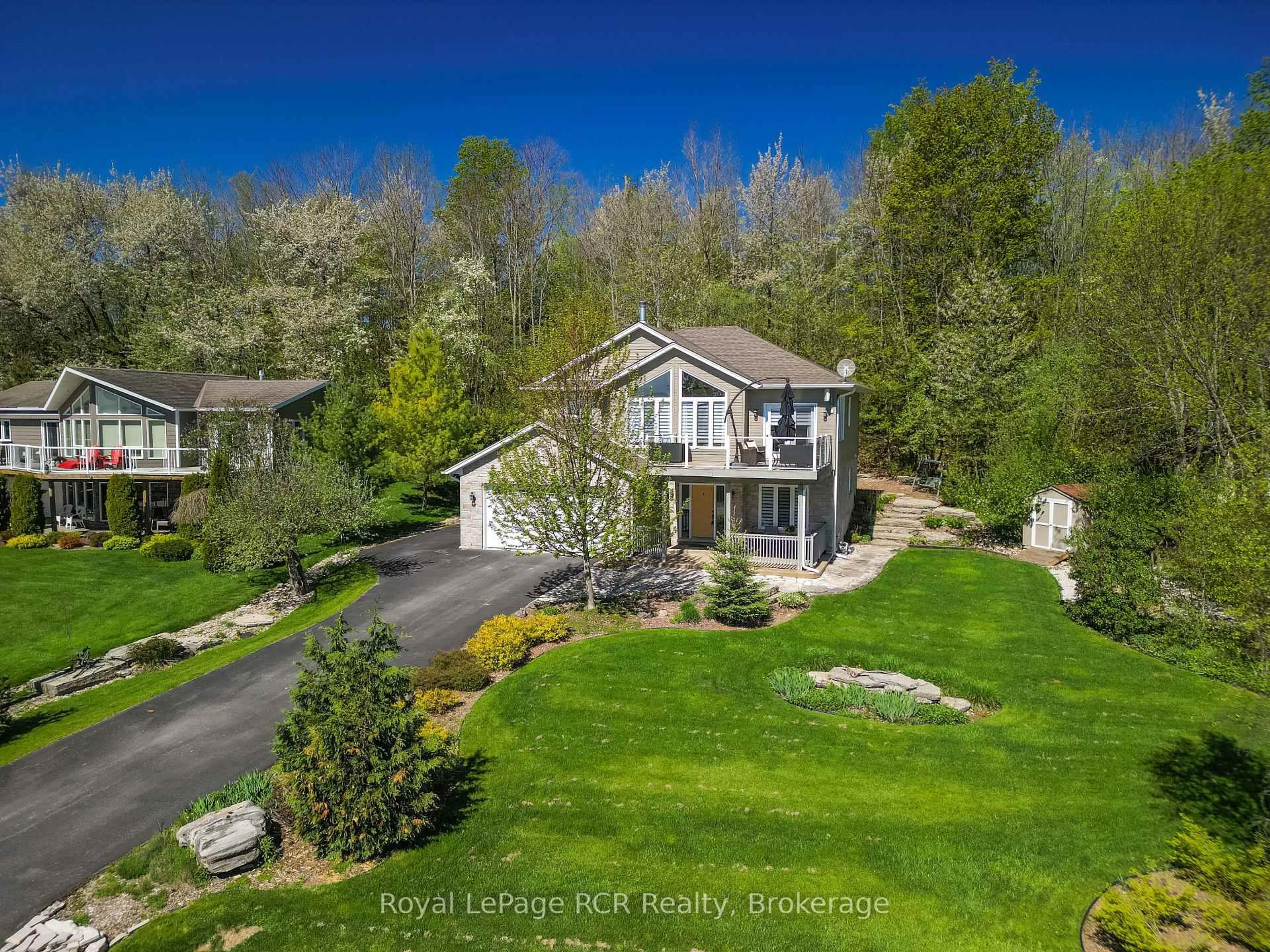A pic from outside/outdoor area/front of a property/back of a property/a pic from drone, unknown for 154 MacIntosh Dr, Georgian Bluffs Ontario N0H 1S0