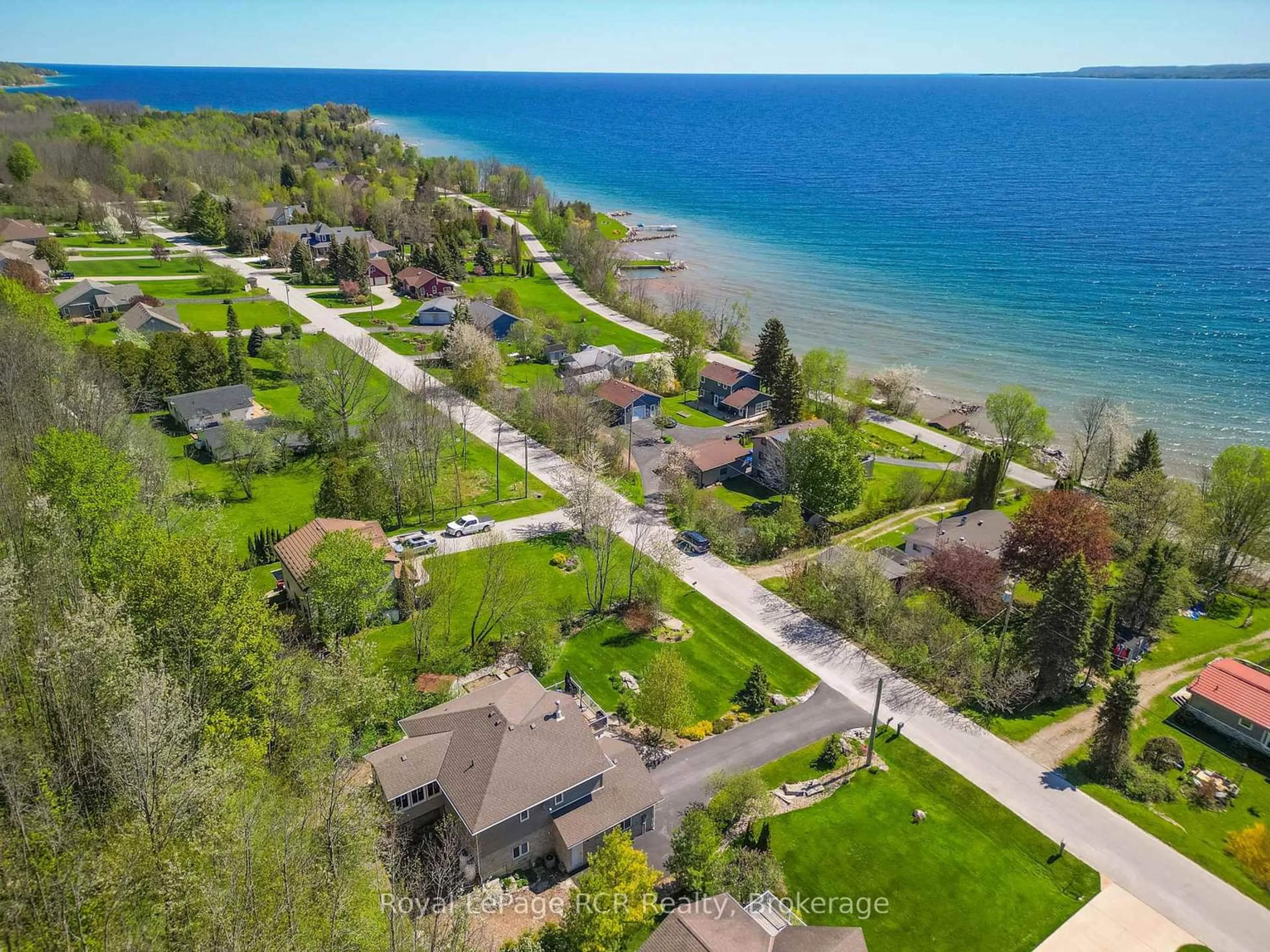 A pic from outside/outdoor area/front of a property/back of a property/a pic from drone, water/lake/river/ocean view for 154 MacIntosh Dr, Georgian Bluffs Ontario N0H 1S0