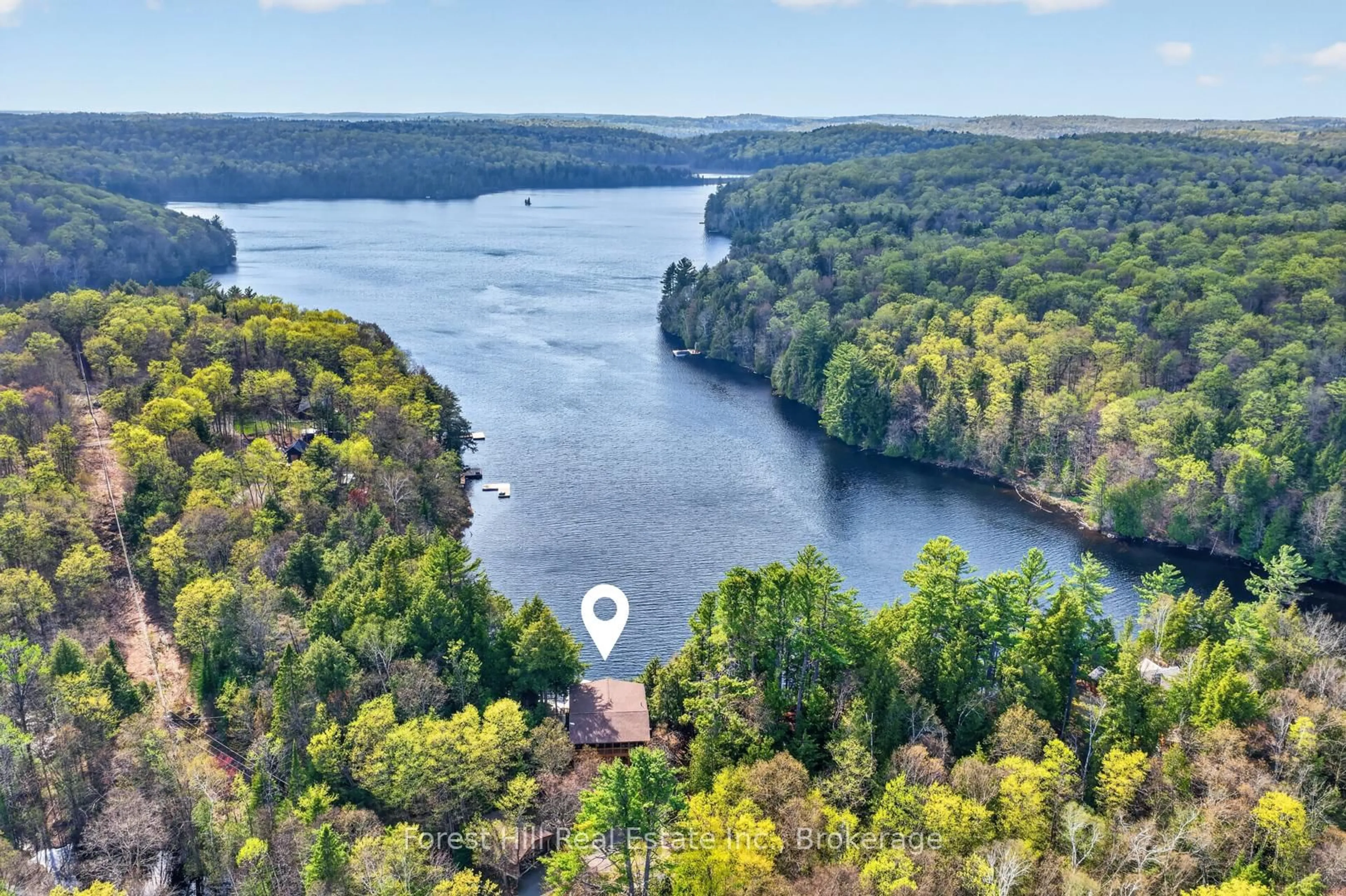 A pic from outside/outdoor area/front of a property/back of a property/a pic from drone, water/lake/river/ocean view for 3611 Livingstone Lake Rd, Algonquin Highlands Ontario P0A 1E0