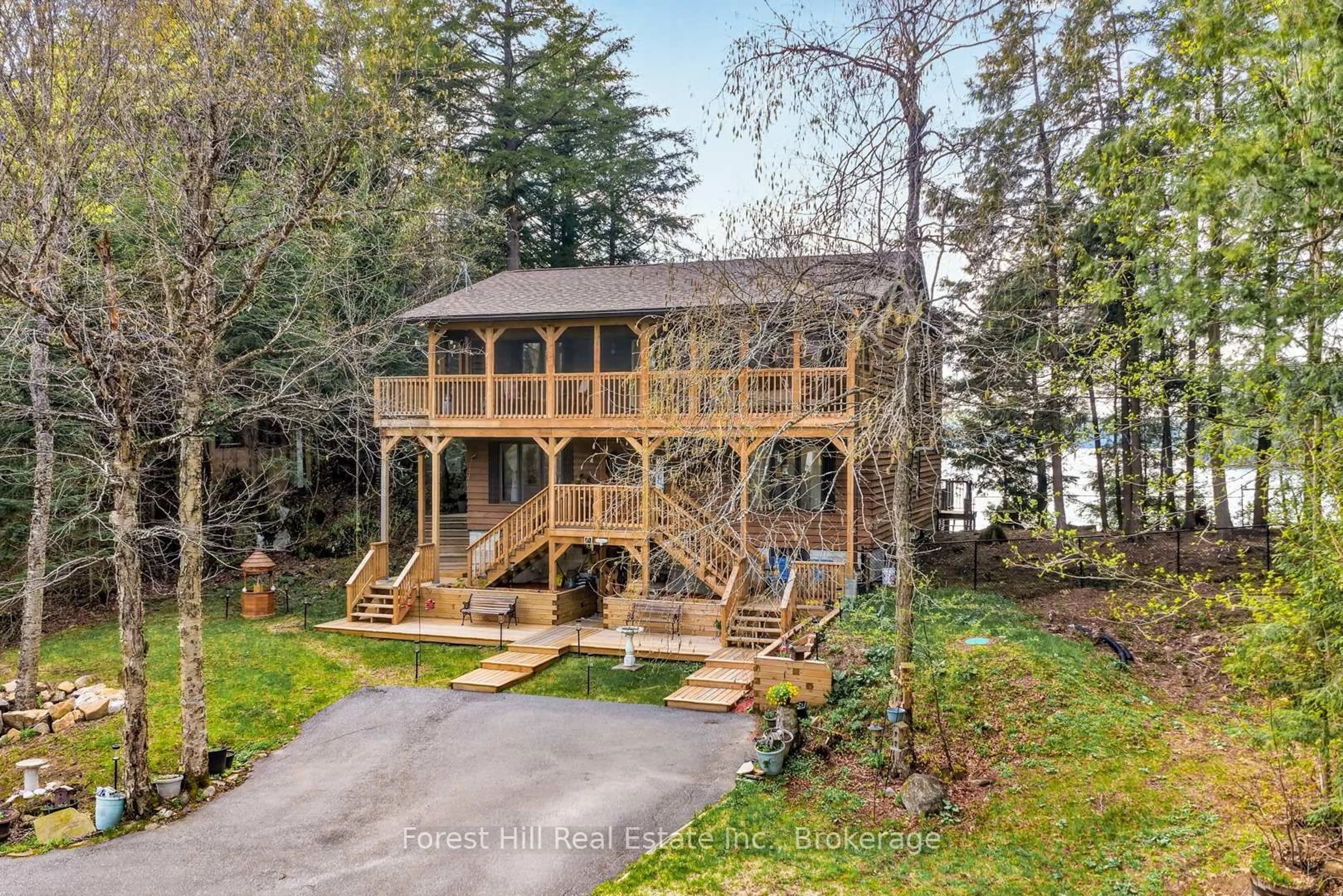 A pic from outside/outdoor area/front of a property/back of a property/a pic from drone, water/lake/river/ocean view for 3611 Livingstone Lake Rd, Algonquin Highlands Ontario P0A 1E0
