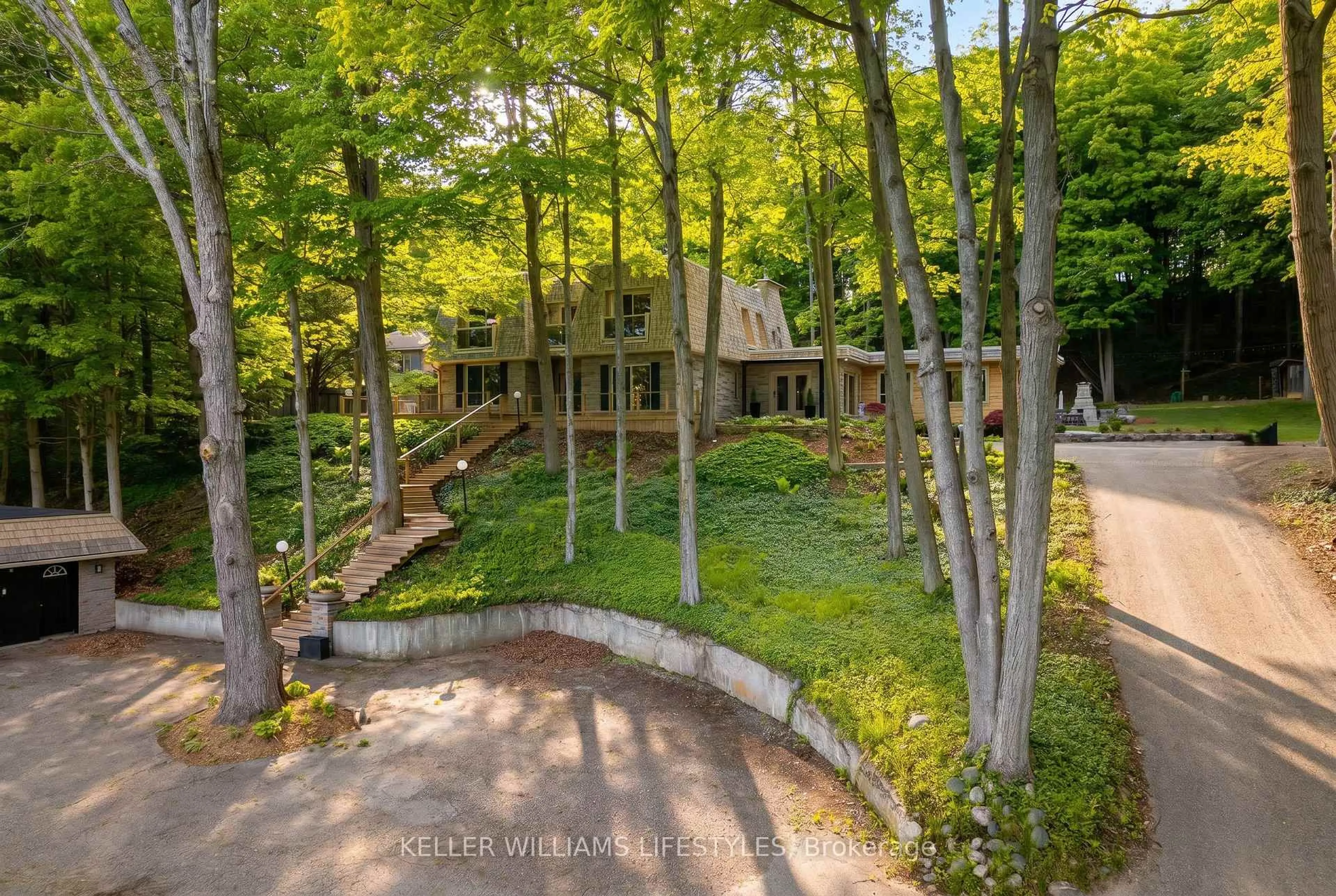 A pic from outside/outdoor area/front of a property/back of a property/a pic from drone, forest/trees view for 10893 Old River Rd, Middlesex Centre Ontario N0L 1R0