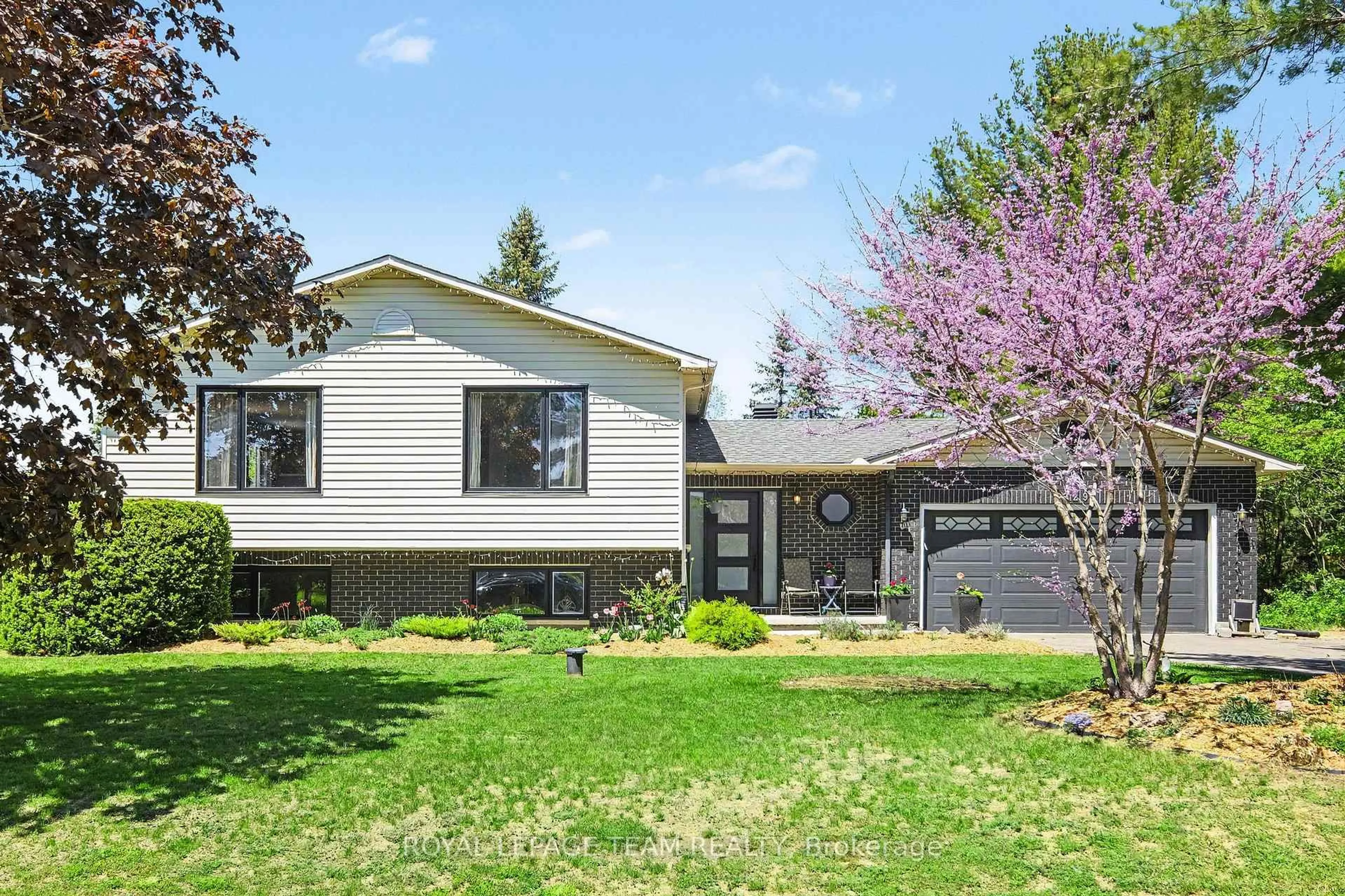 Home with vinyl exterior material, street for 3229 WILD CHERRY Dr, Osgoode Ontario K0A 2W0