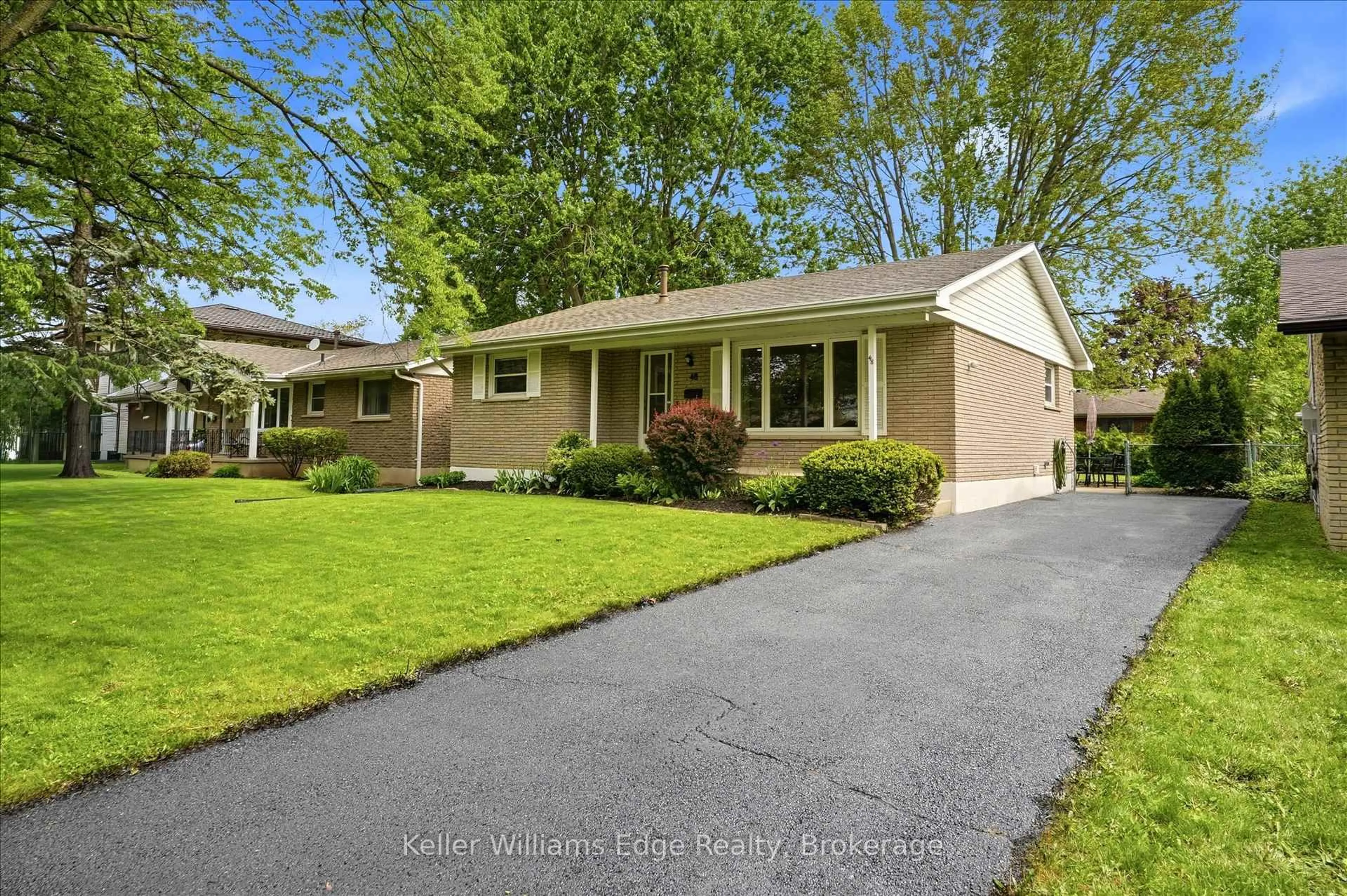 Home with vinyl exterior material, street for 48 Winding Way, Brantford Ontario N3R 3S3