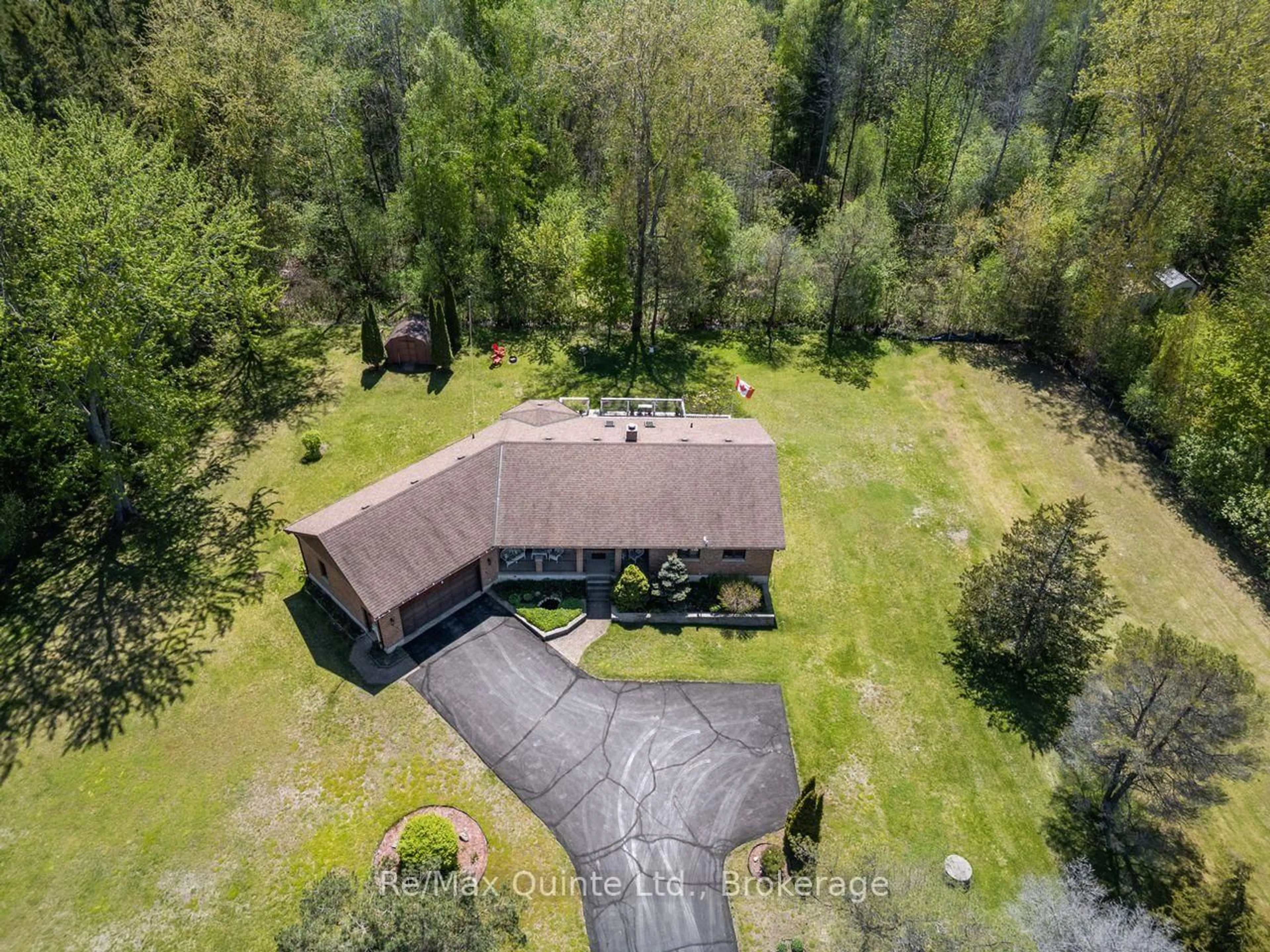 A pic from outside/outdoor area/front of a property/back of a property/a pic from drone, forest/trees view for 21858 Loyalist Pkwy, Quinte West Ontario K0K 1L0