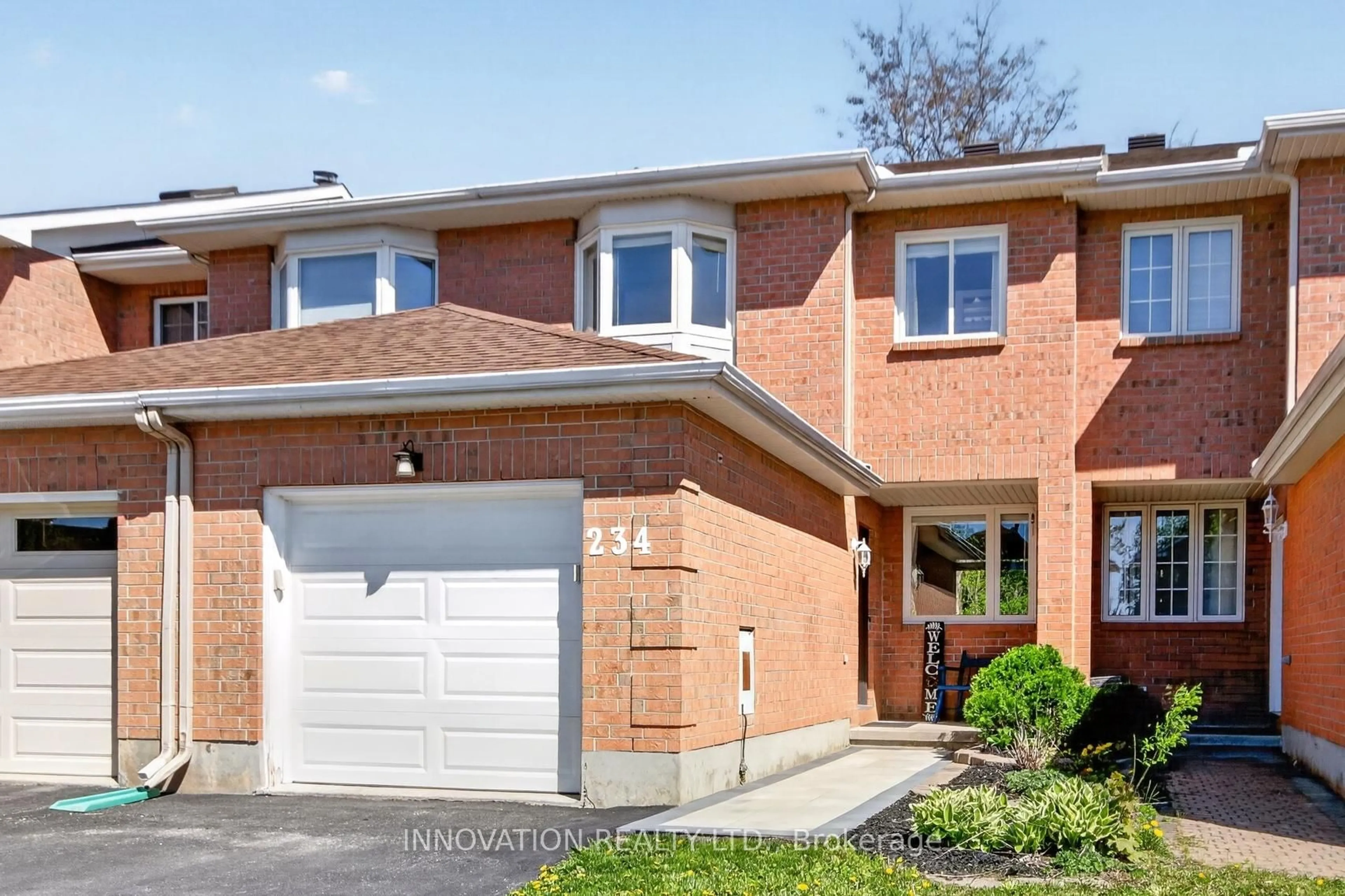 Home with brick exterior material, street for 234 Mountshannon Dr, Ottawa Ontario K2J 4N5
