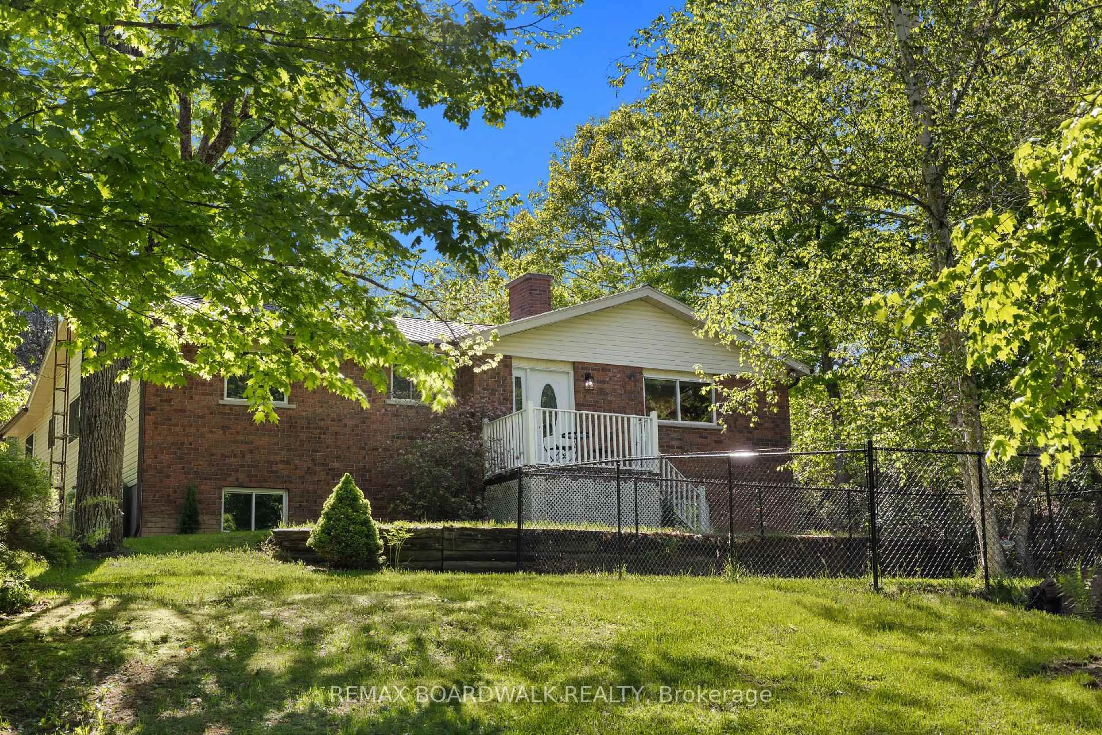 Home with brick exterior material, street for 802 Beach Lane, Leeds and the Thousand Islands Ontario K0E 1N0
