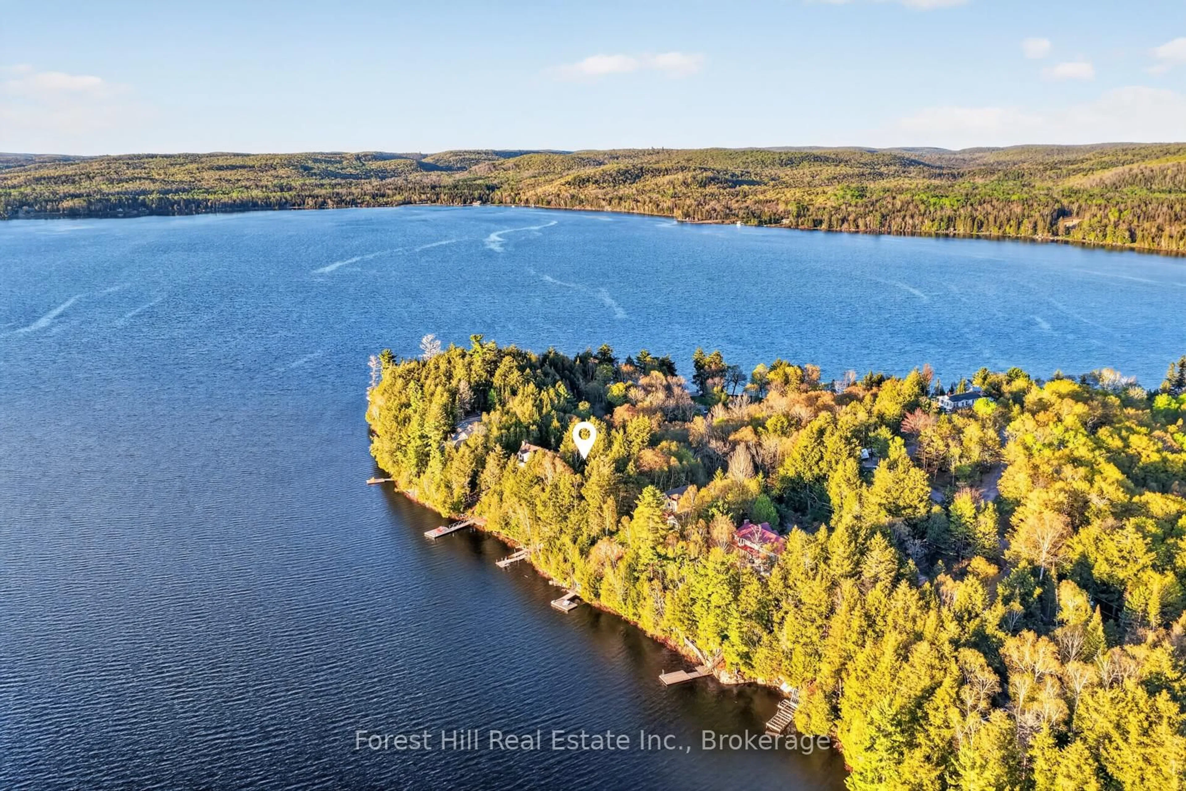 A pic from outside/outdoor area/front of a property/back of a property/a pic from drone, water/lake/river/ocean view for 136 Rock Point Rd, Kearney Ontario P0A 1M0