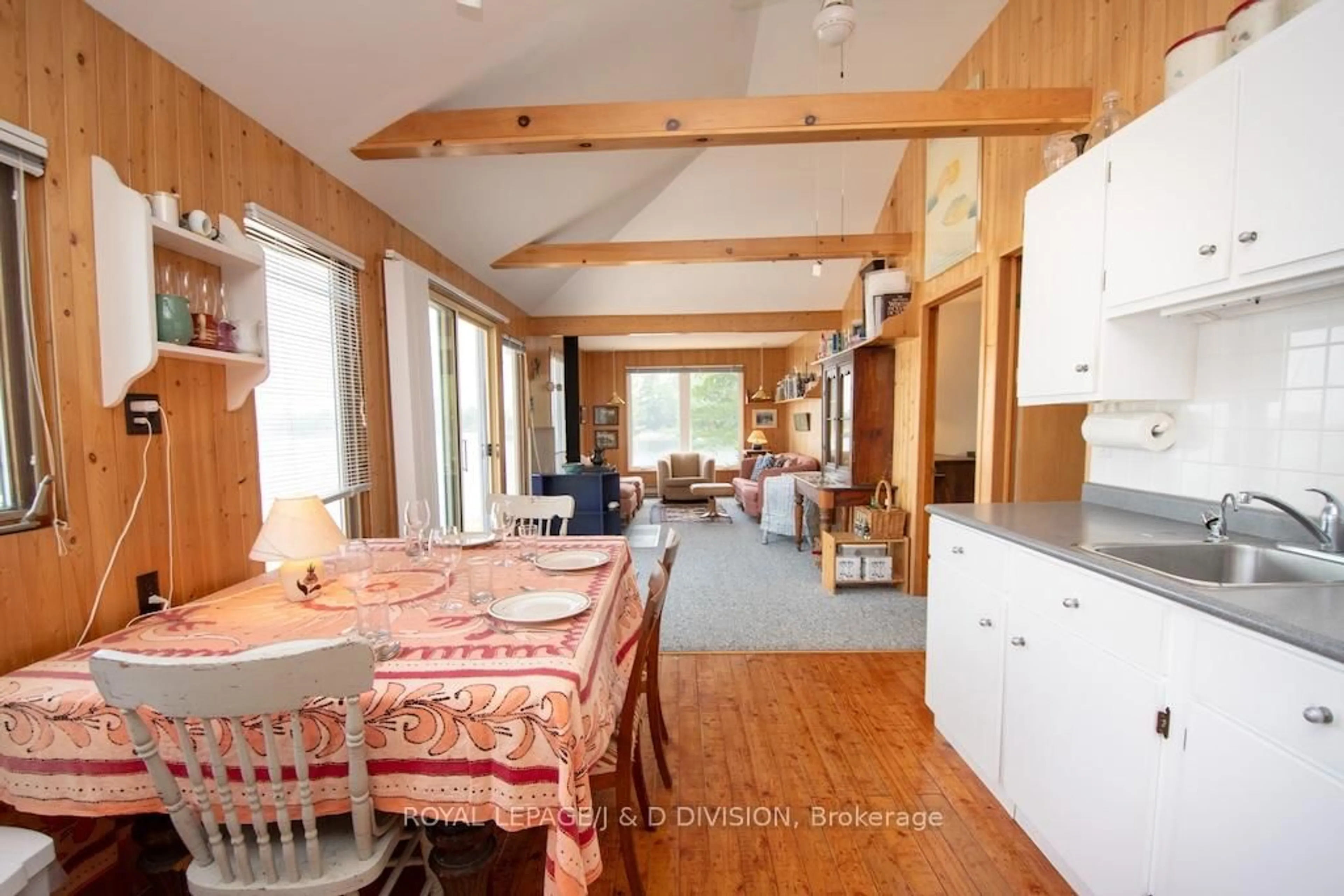 Dining room, wood/laminate floor for 4446 Is 107 Stoney Lake Island, North Kawartha Ontario K0L 2H0