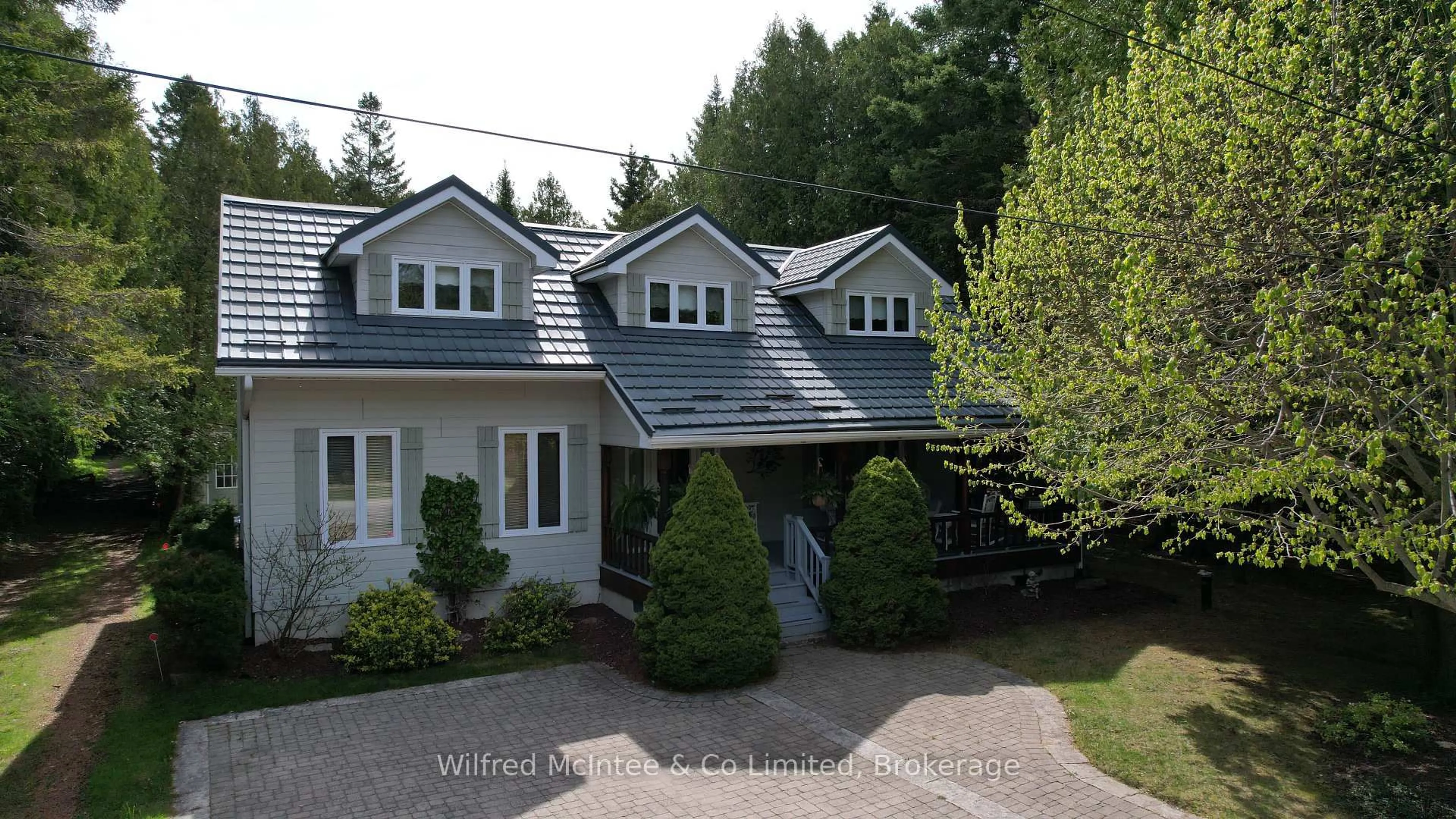 A pic from outside/outdoor area/front of a property/back of a property/a pic from drone, street for 925 King Edward Ave, South Bruce Peninsula Ontario N0H 2G0